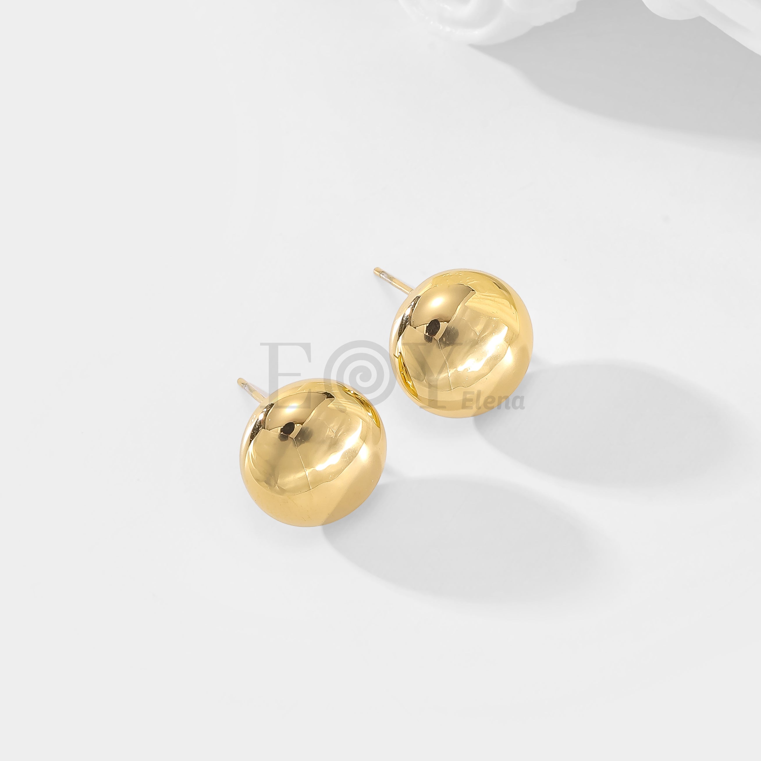 Pendientes bola plana
