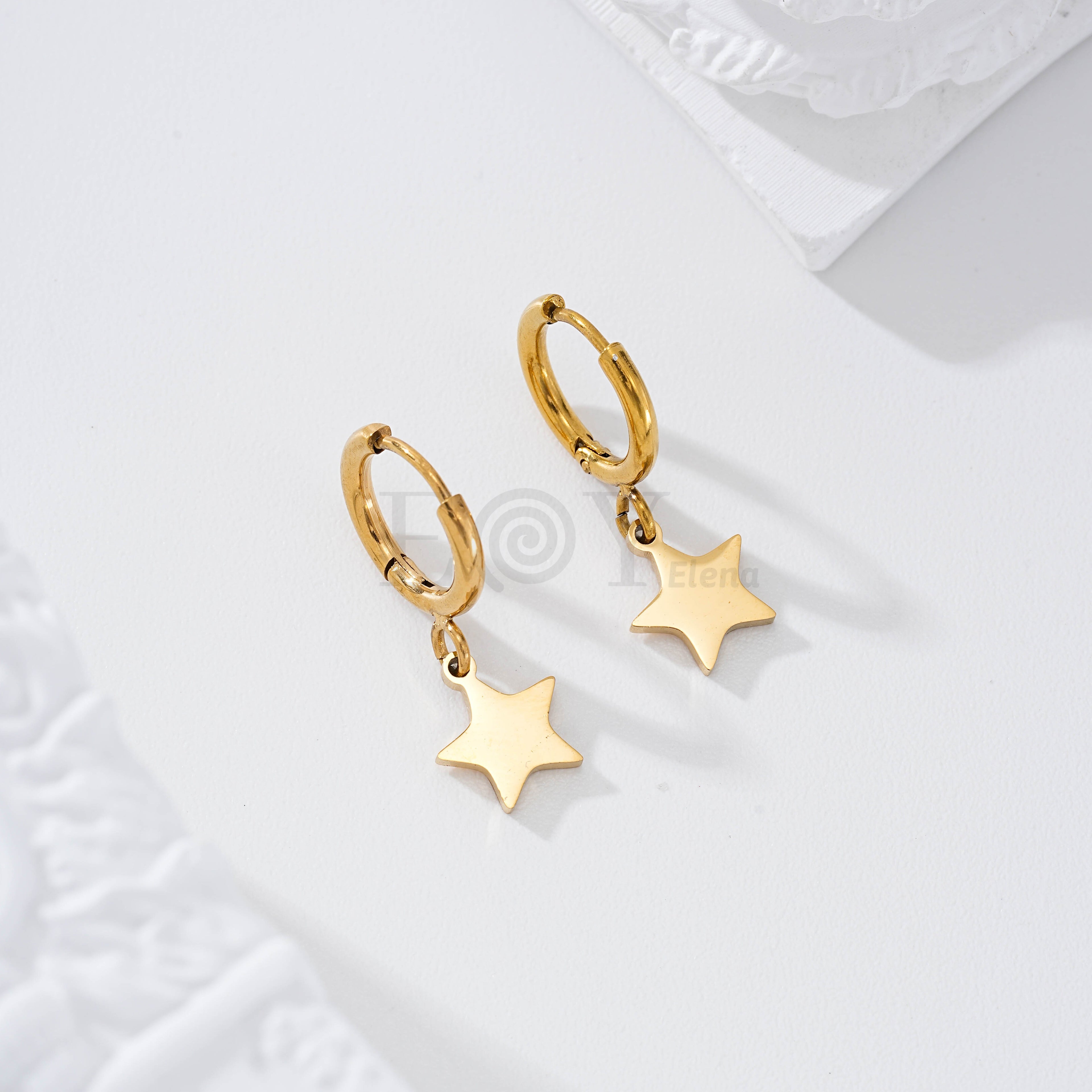 Pendientes aro con estrella plana acero