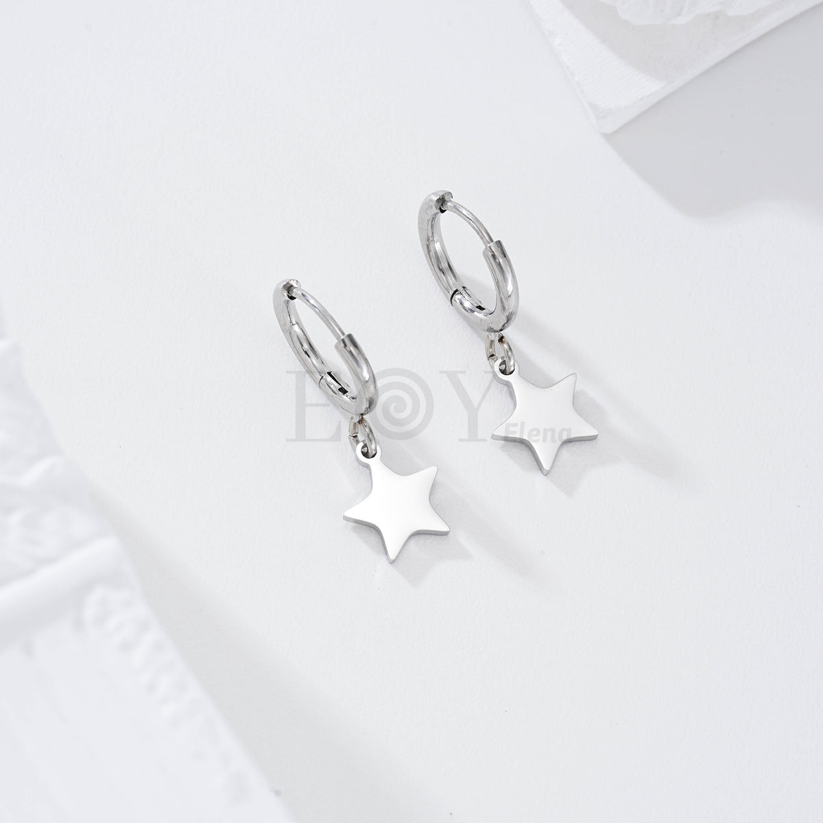 Pendientes aro con estrella plana acero