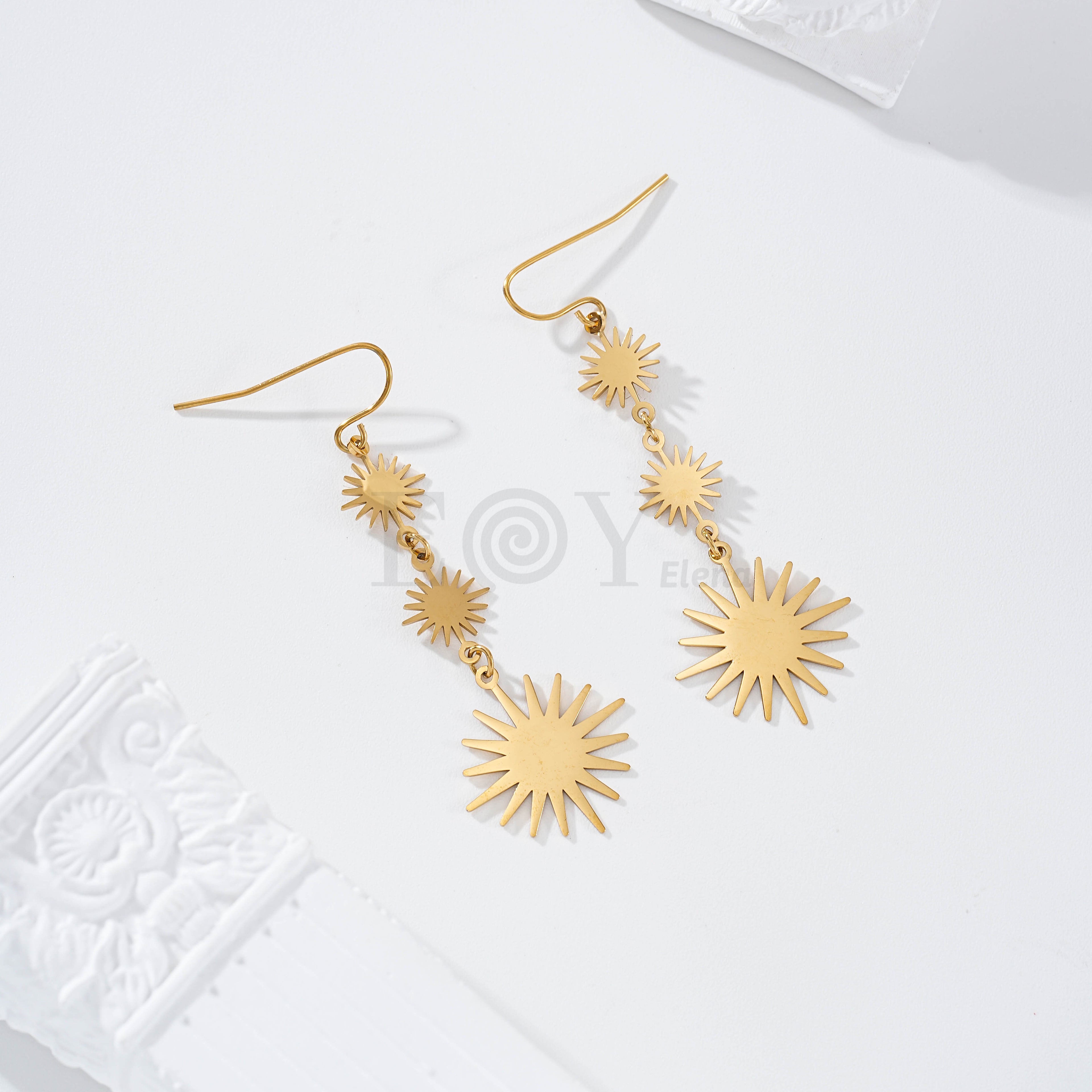 Pendientes tres soles acero