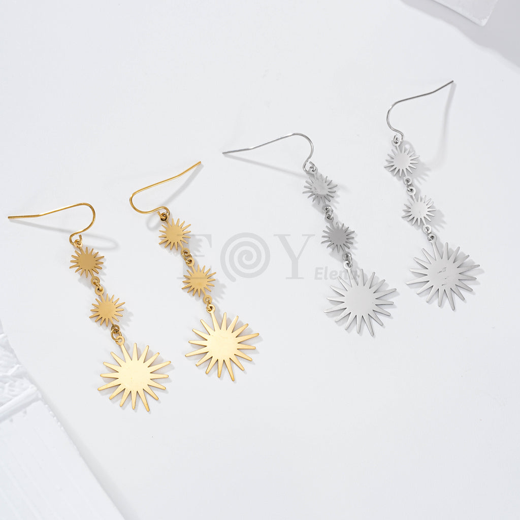 Pendientes tres soles acero