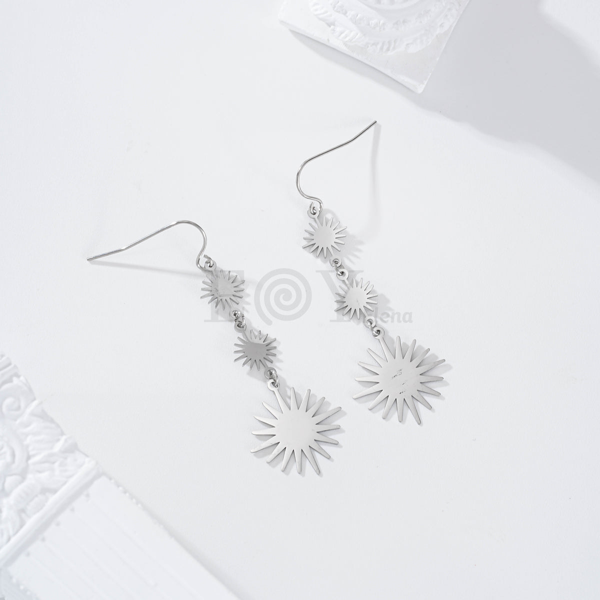 Pendientes tres soles acero