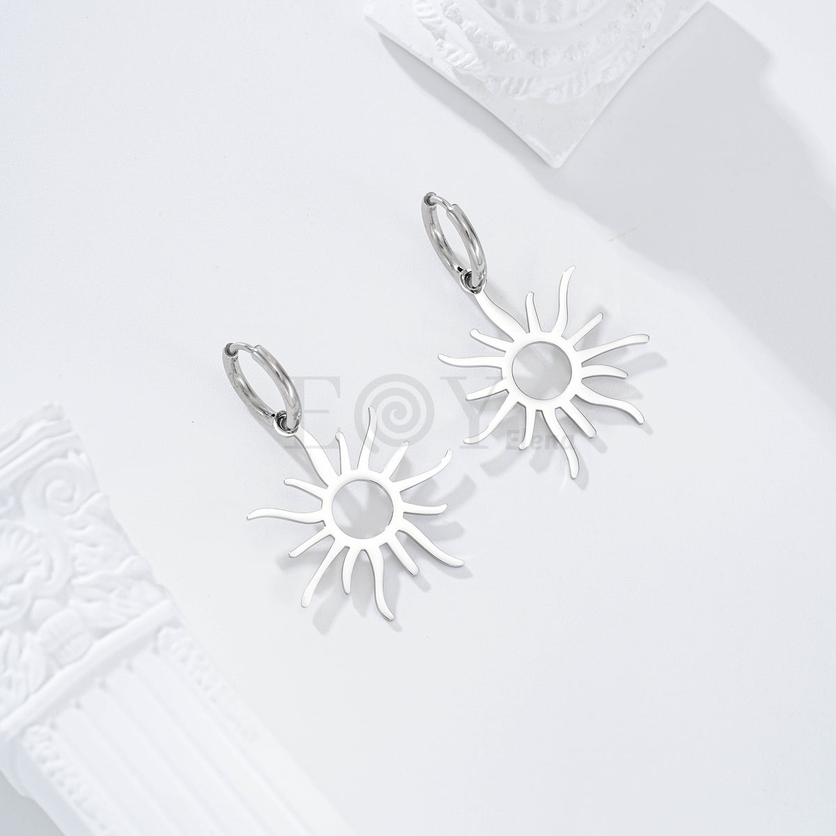 Pendientes de aro con sol acero