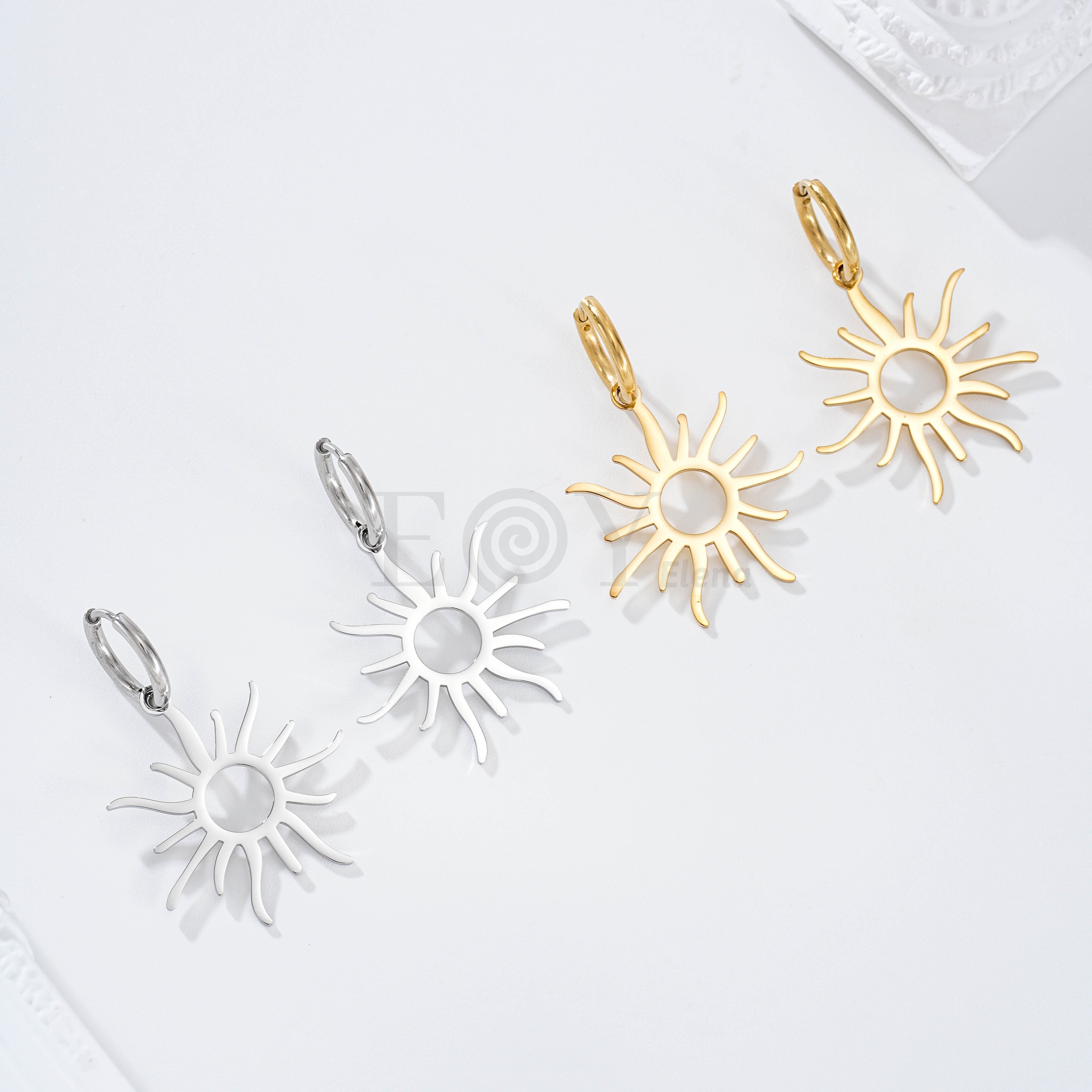 Pendientes de aro con sol acero