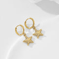 Pendientes de aro con estrella relieve