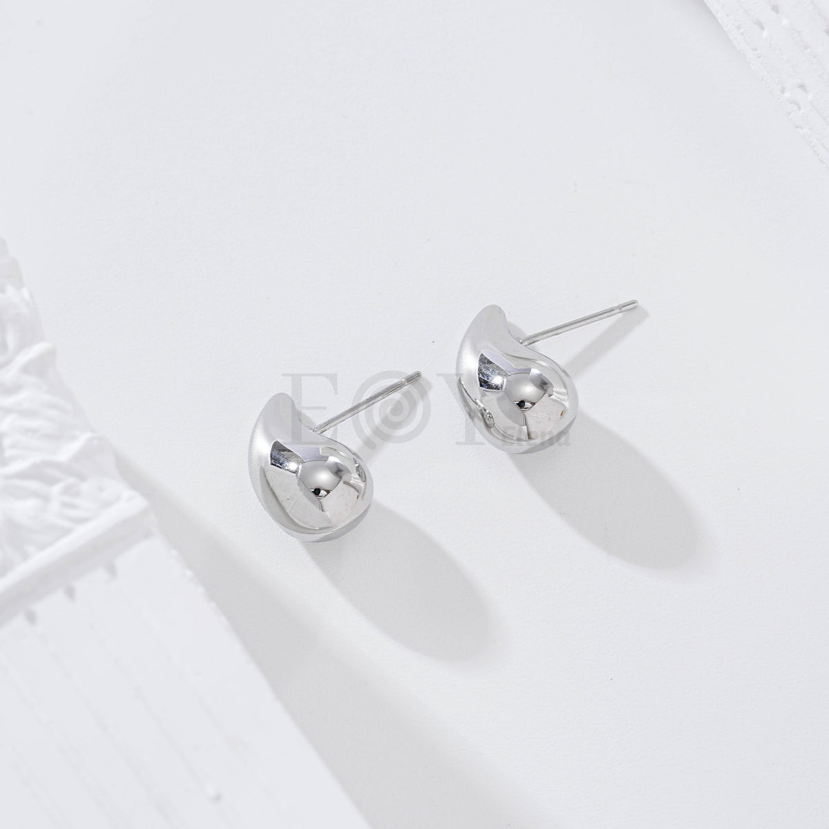 Pendientes gota acero