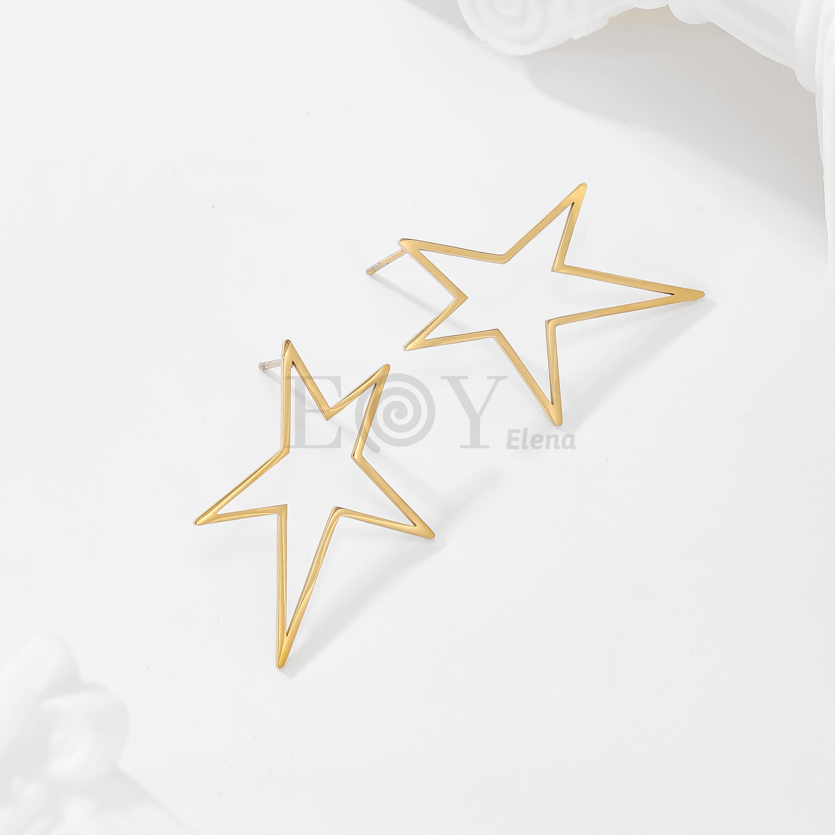Pendientes estrella hueca