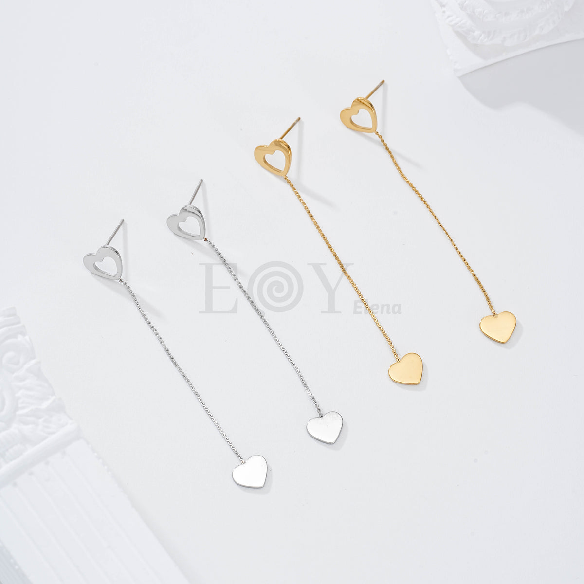 Pendientes corazón hueco y plano acero
