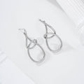 Irregularly shaped steel earrings