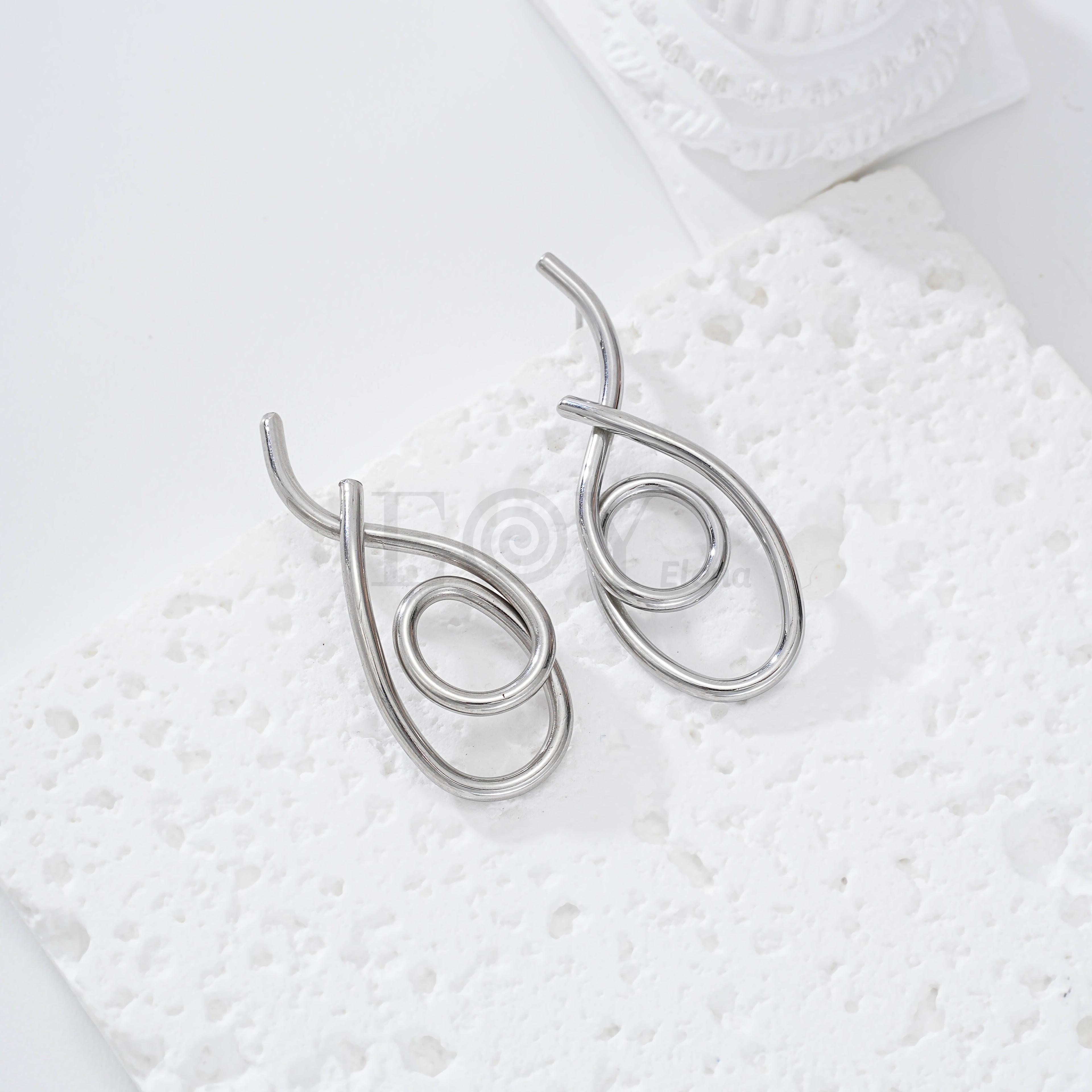 Pendientes espiral forma irregular acero