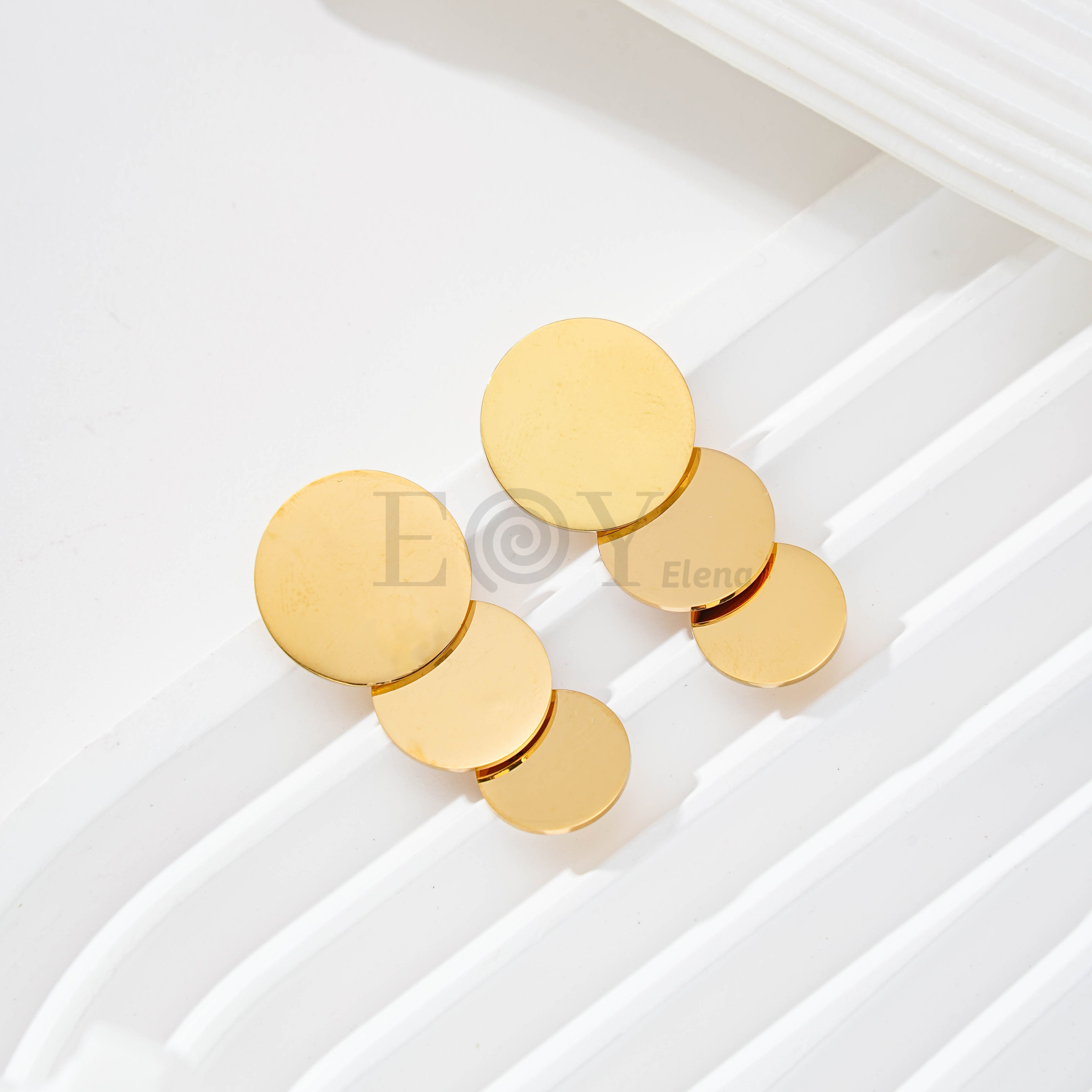 Pendientes de tres chapas