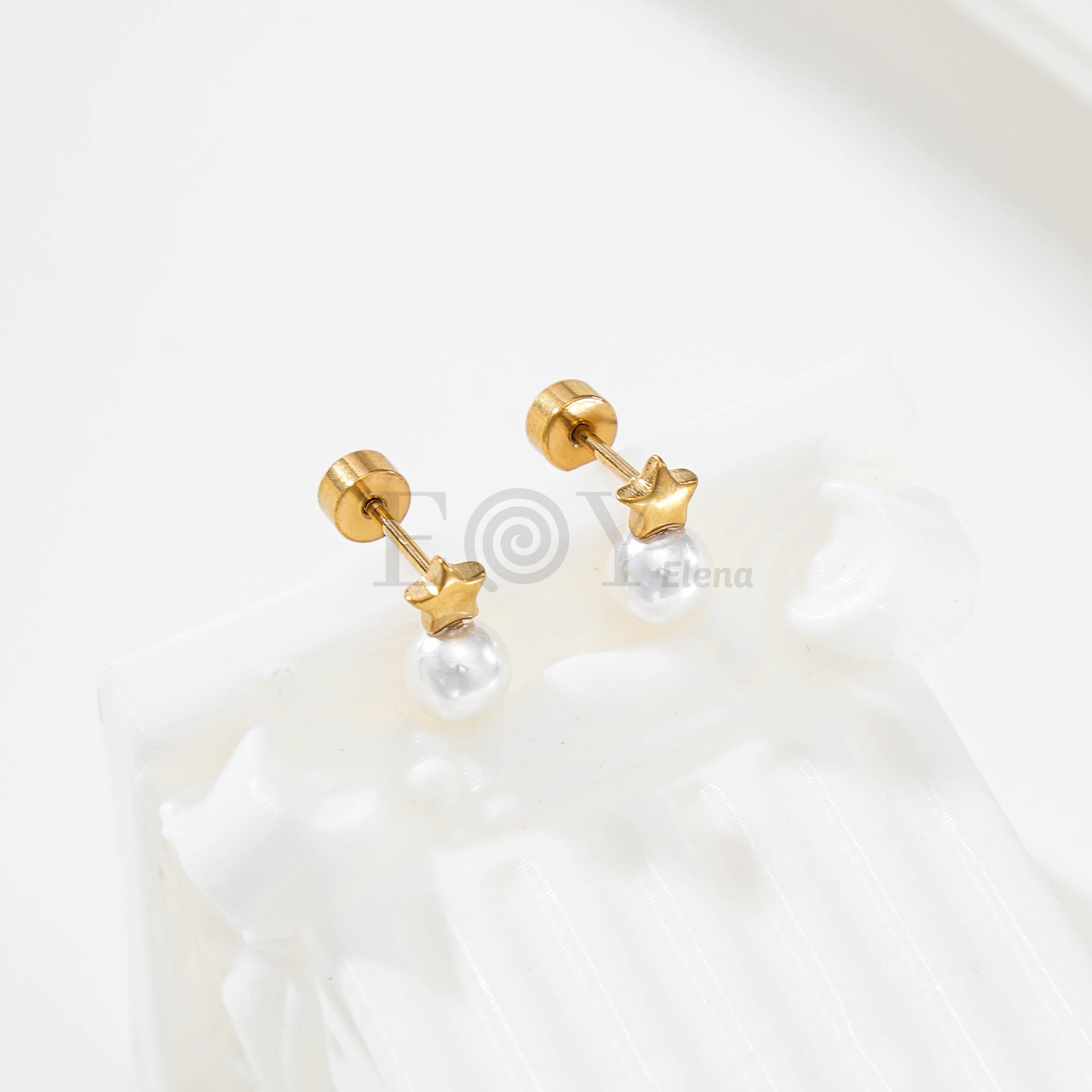Pendientes estrella y perla