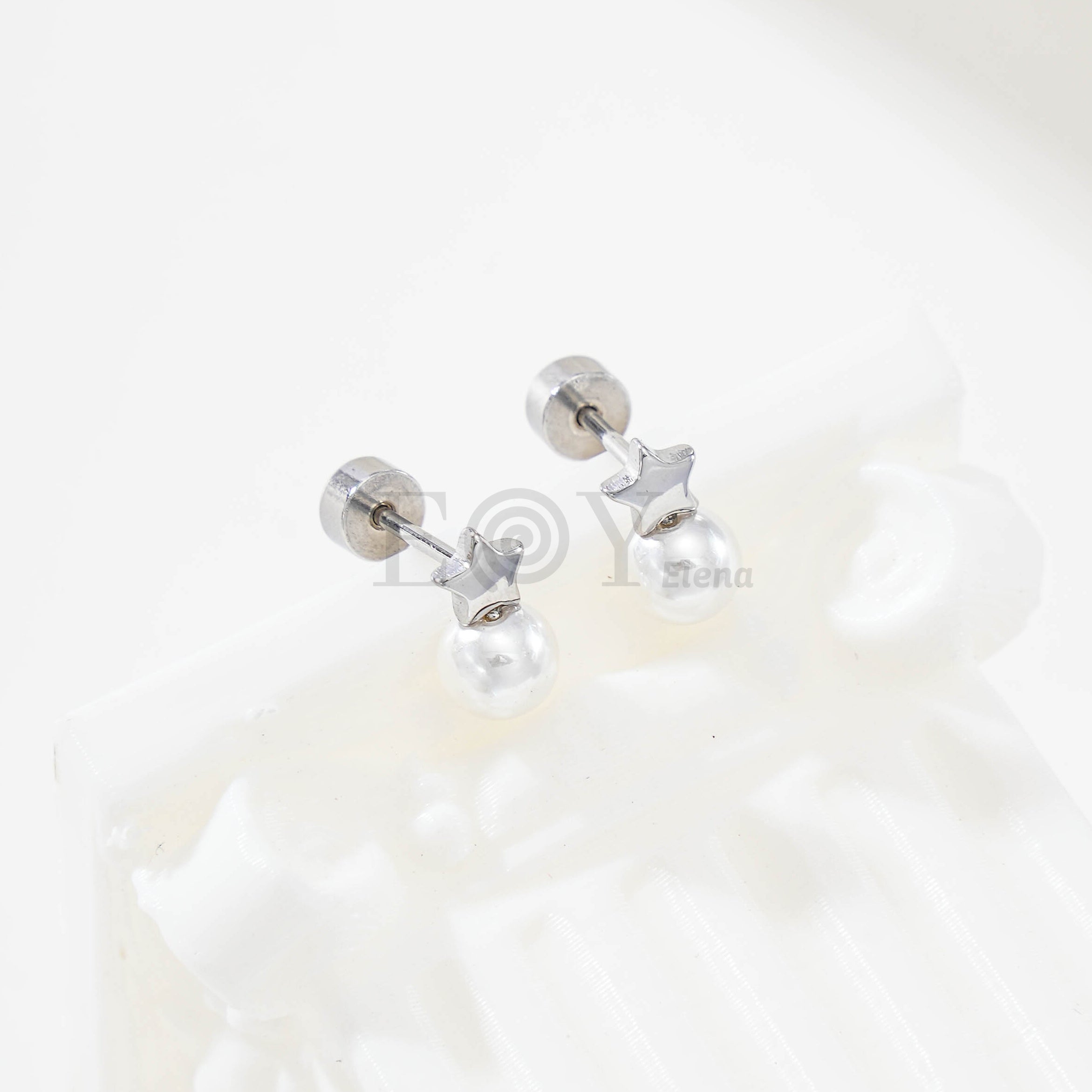 Pendientes estrella y perla