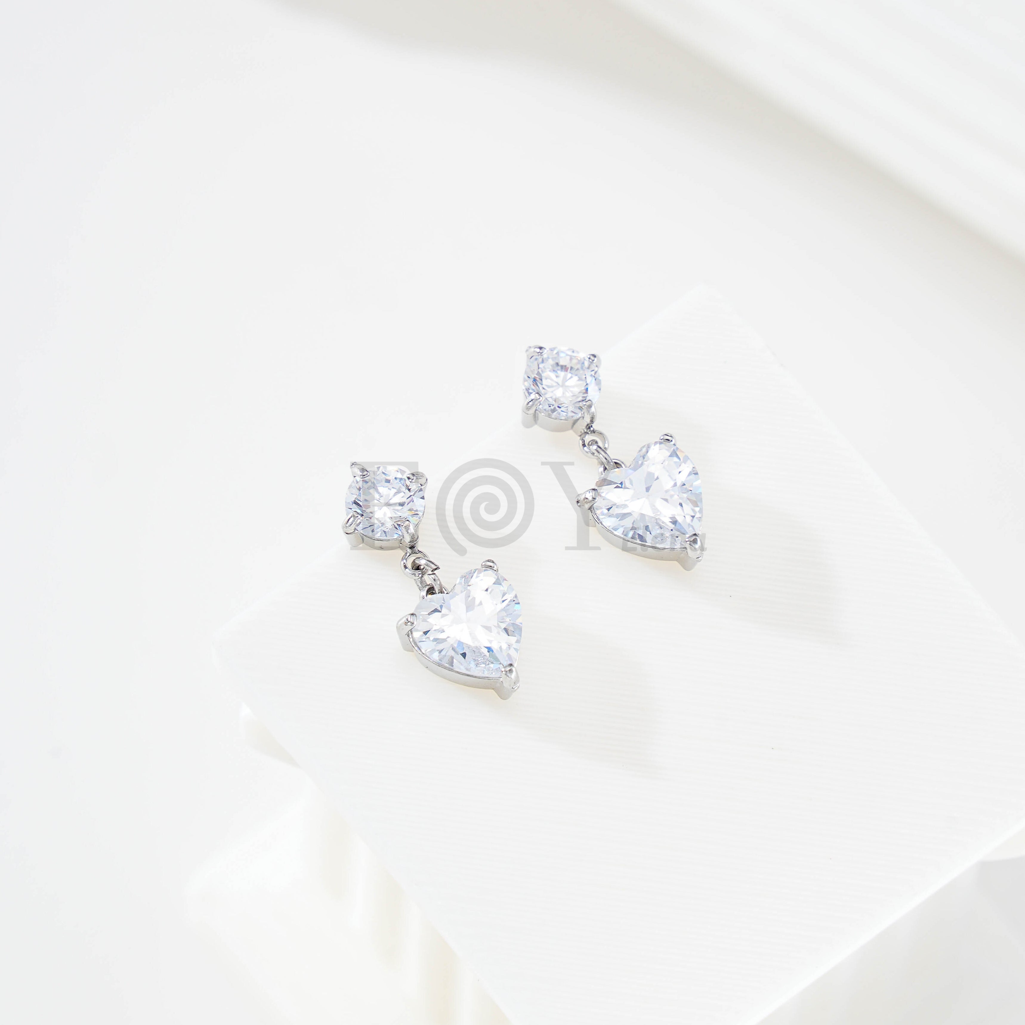 Pendientes circonita doble corazón
