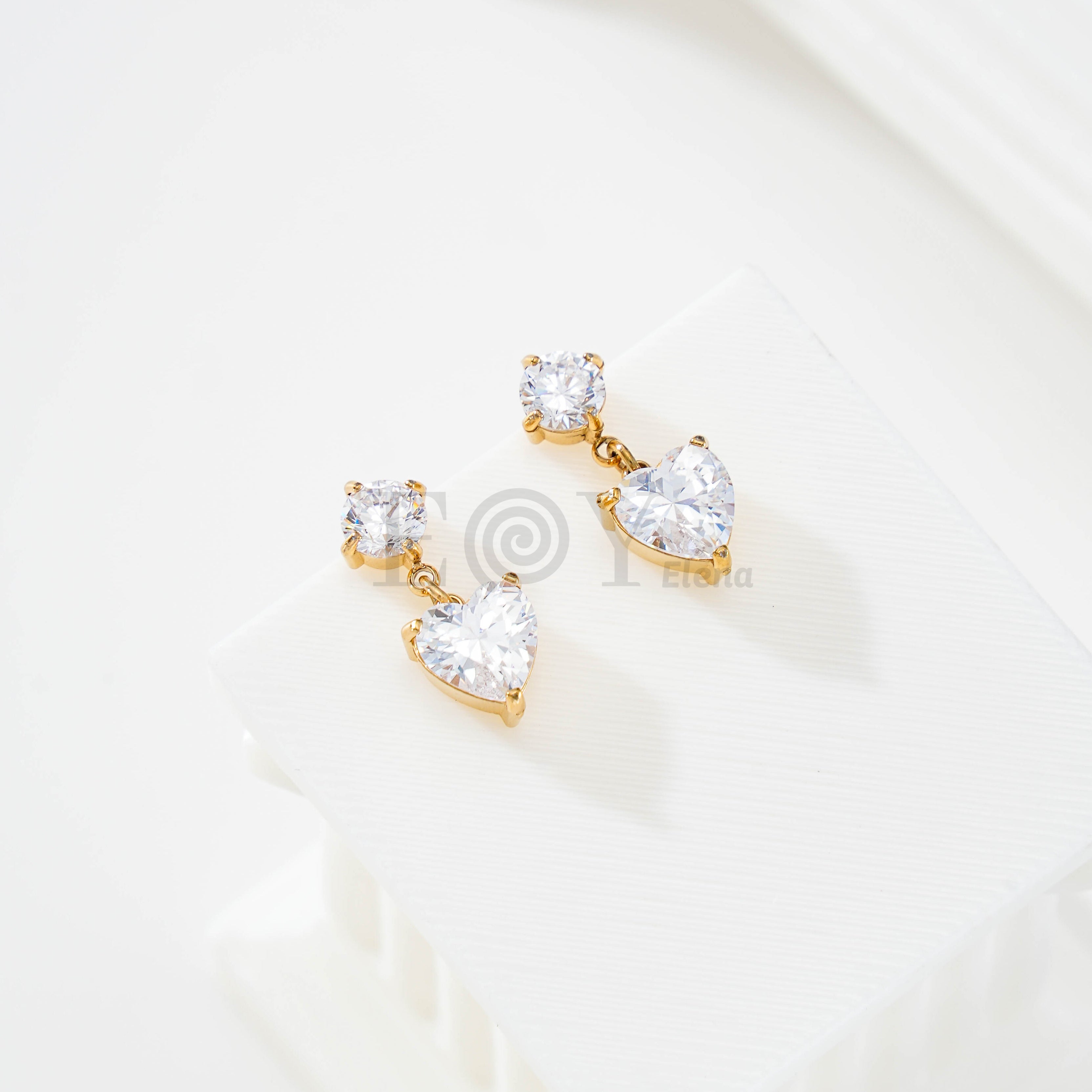 Pendientes circonita doble corazón