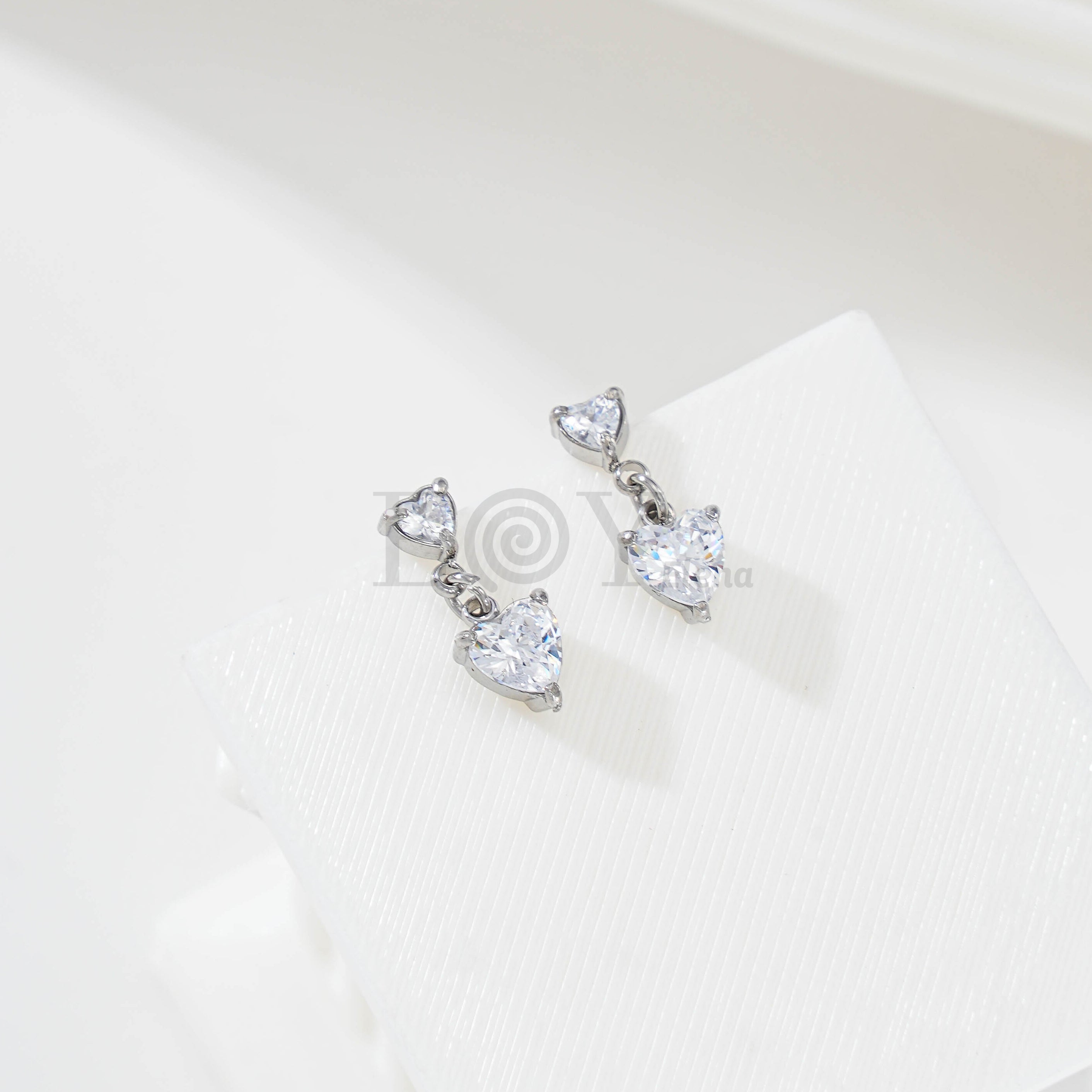 Pendientes doble circonita corazón
