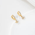 Pendientes de aro con triple circonita