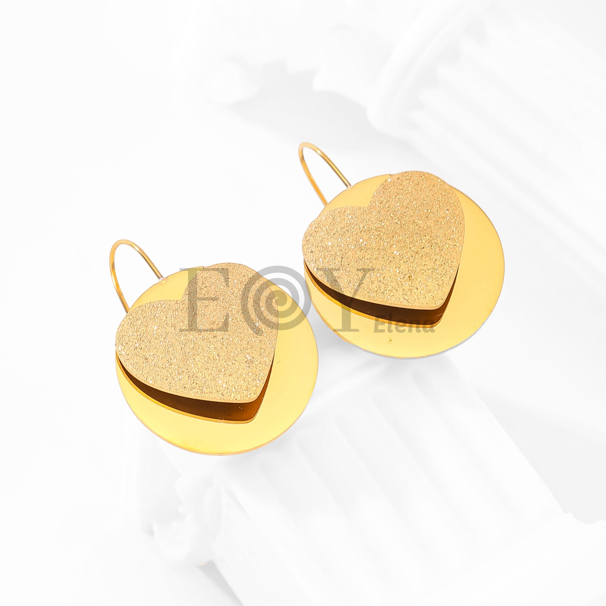 Pendientes corazón brillo y chapa