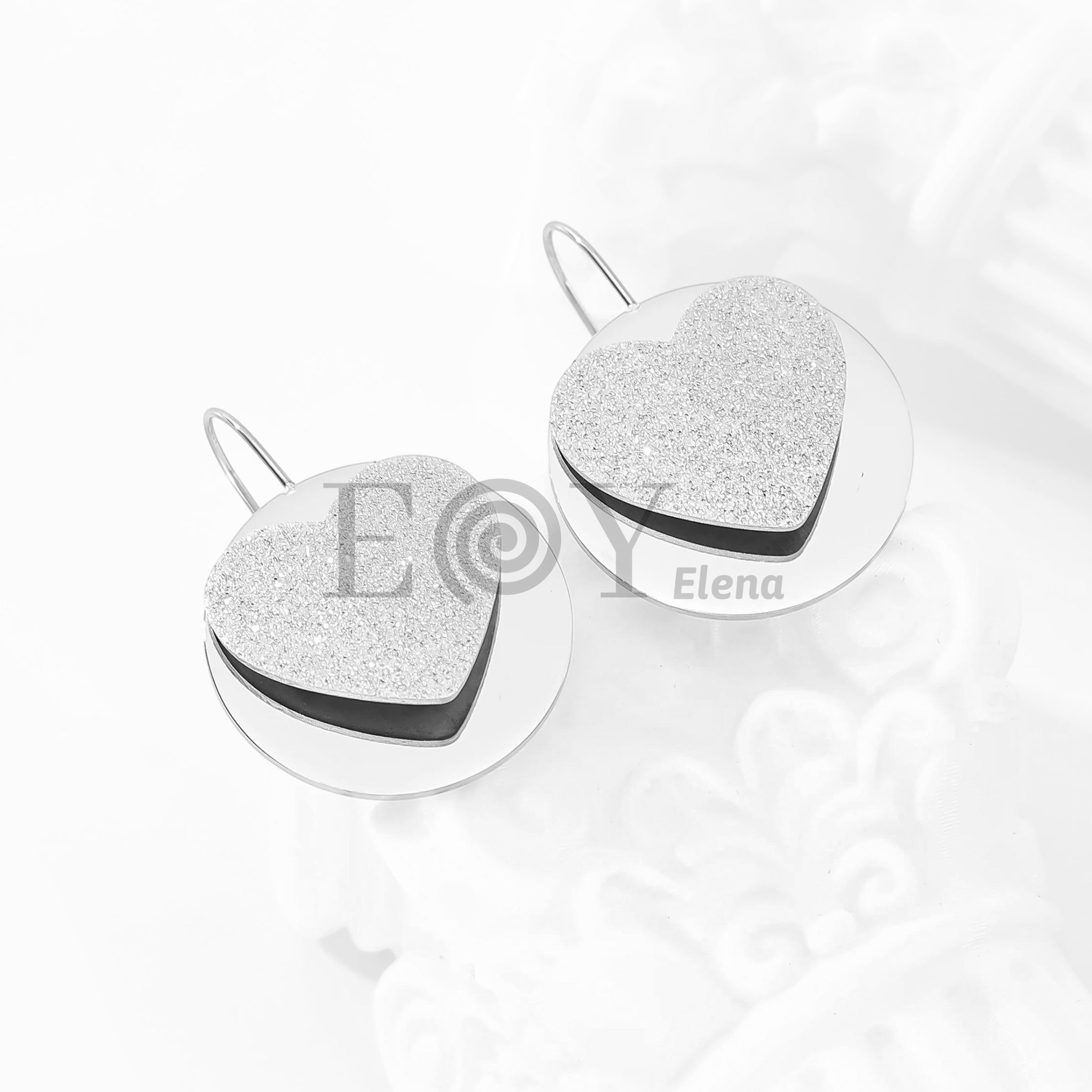 Pendientes corazón brillo y chapa
