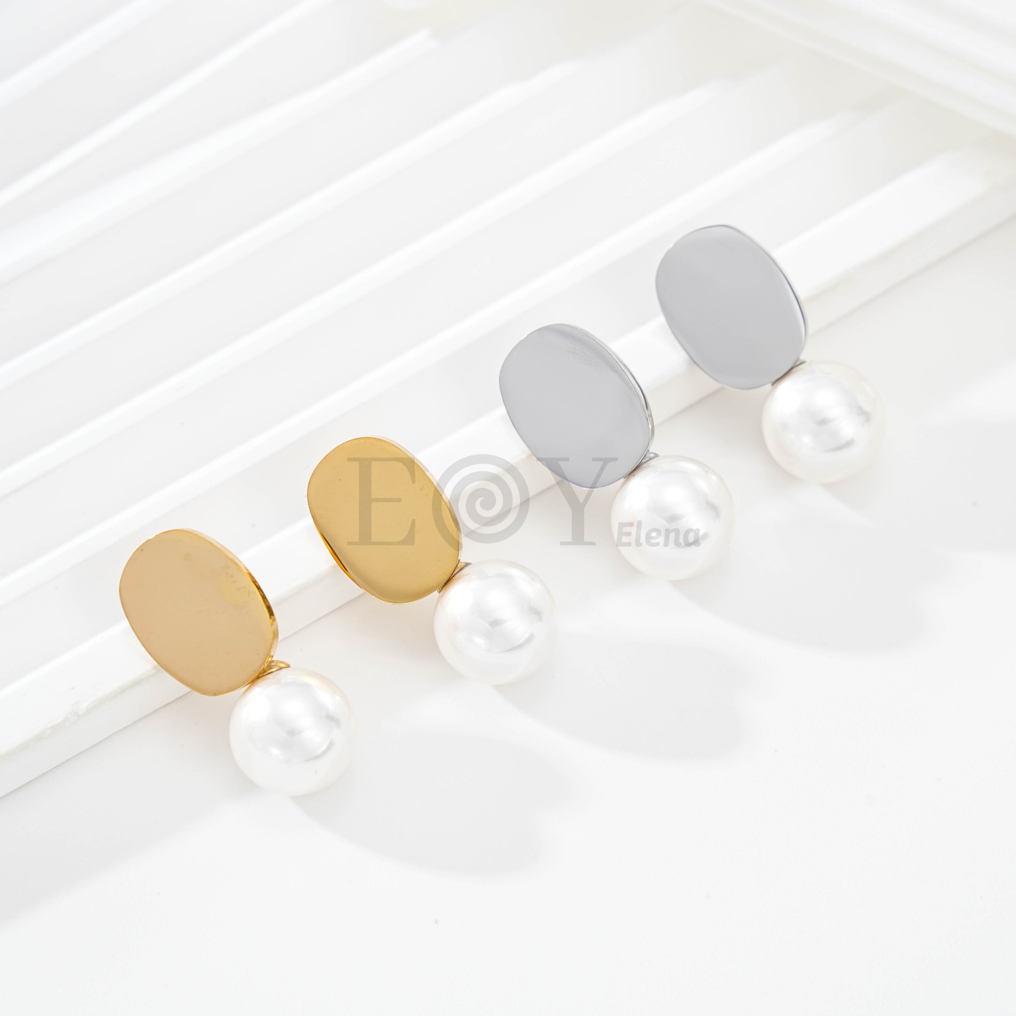 Pendientes chapa ovalada con perla