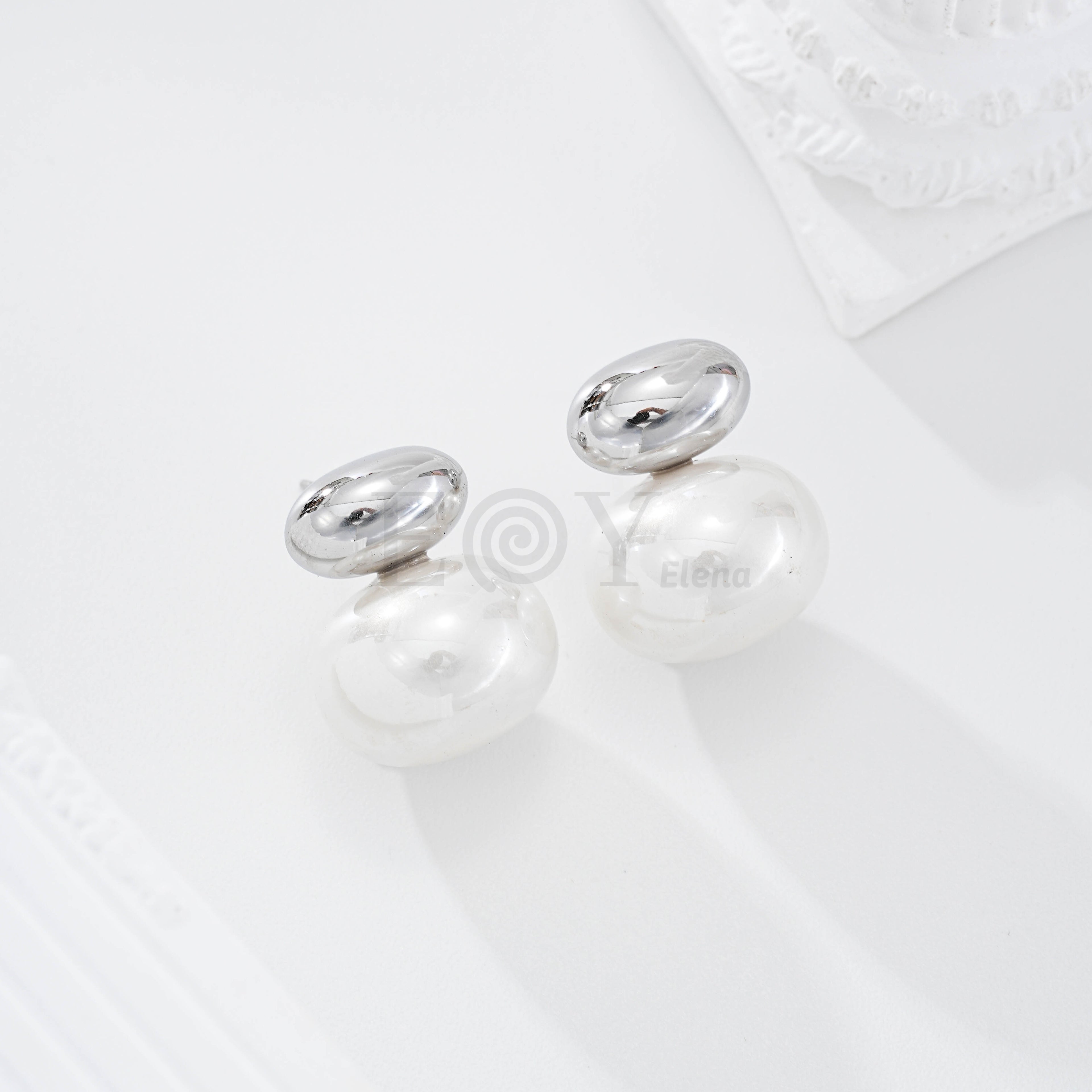 Pendientes con óvalo horizontal y perla acero