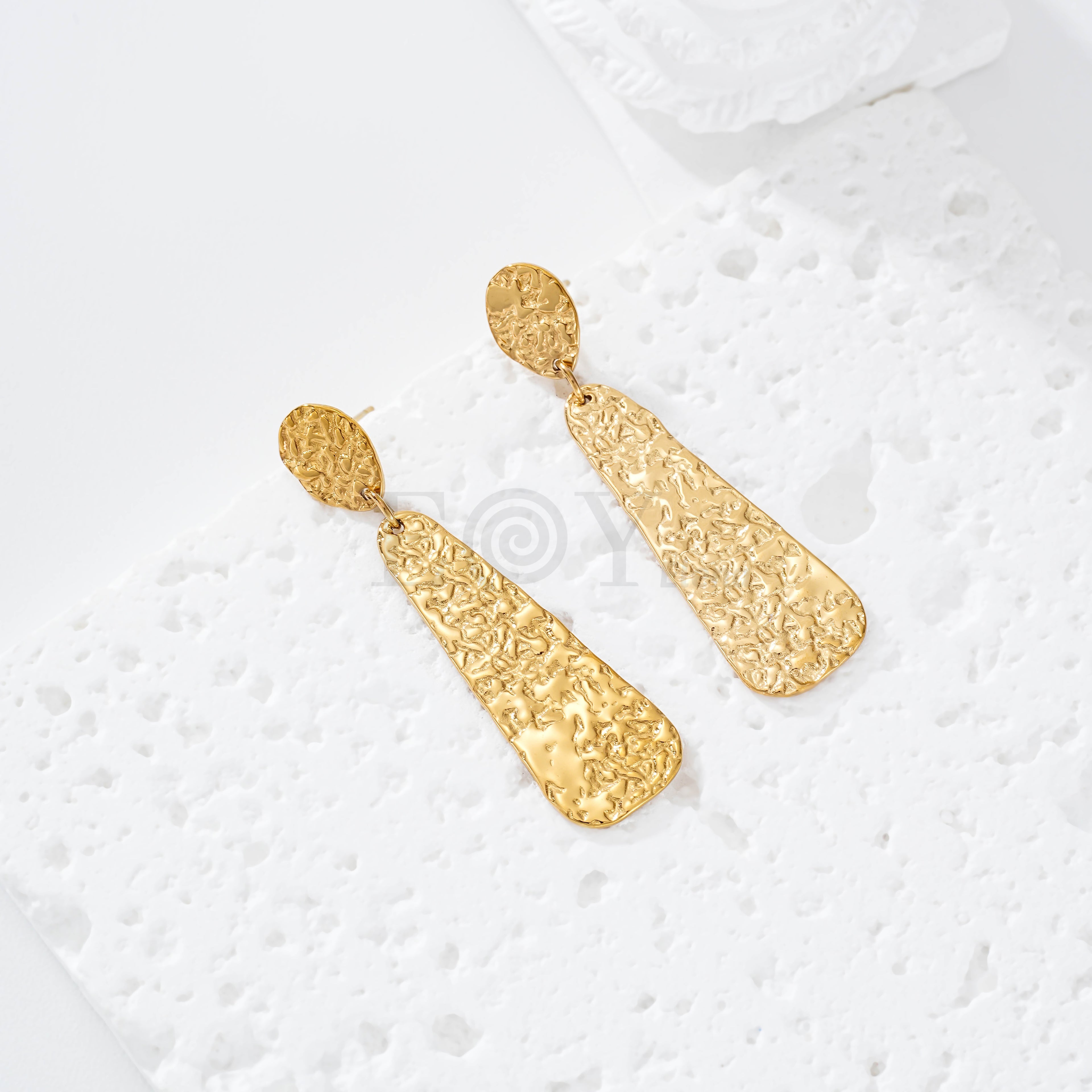 Pendientes alargado textura