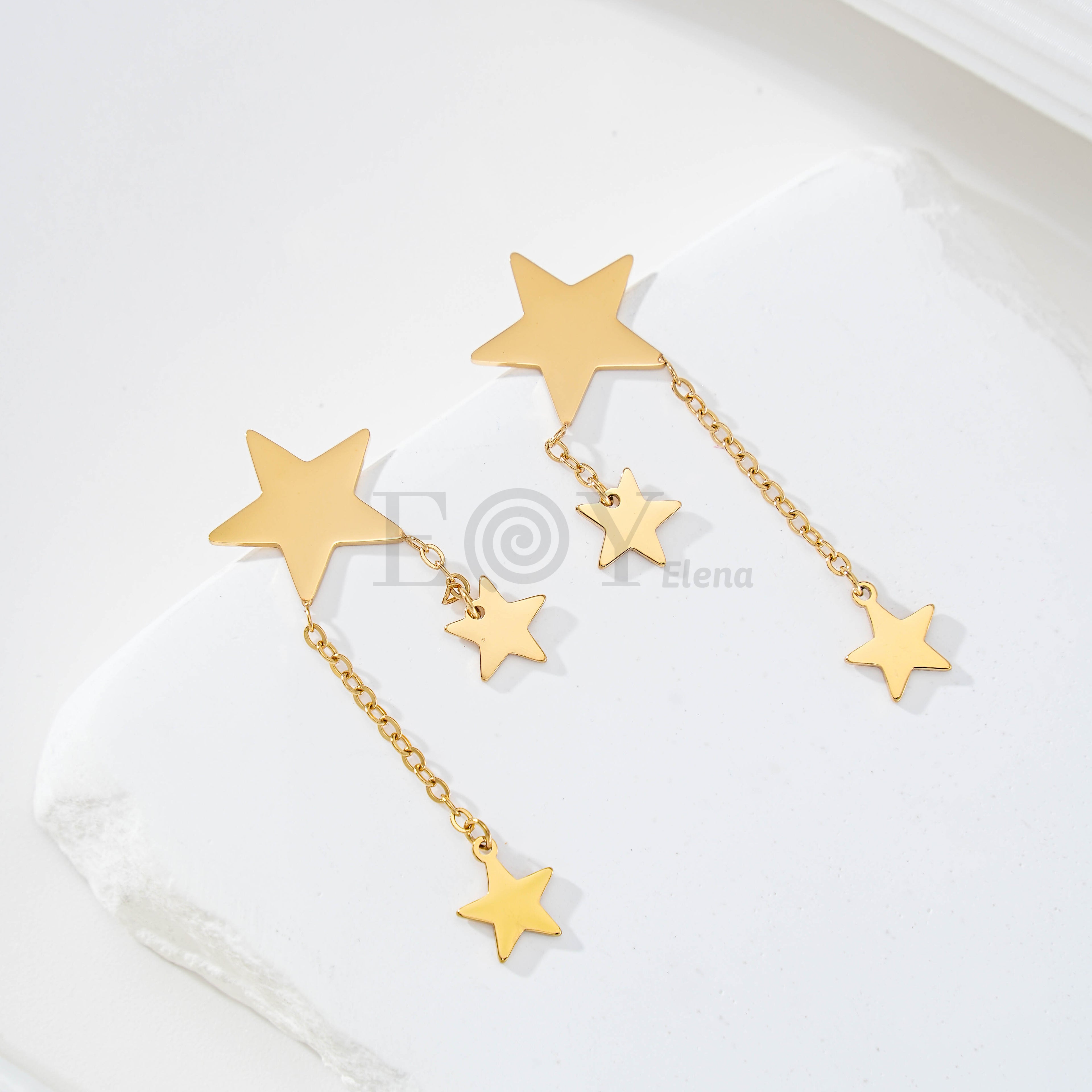 Pendientes de estrella con dos cadenas