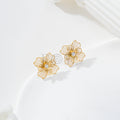Pendientes flor calada con circonita