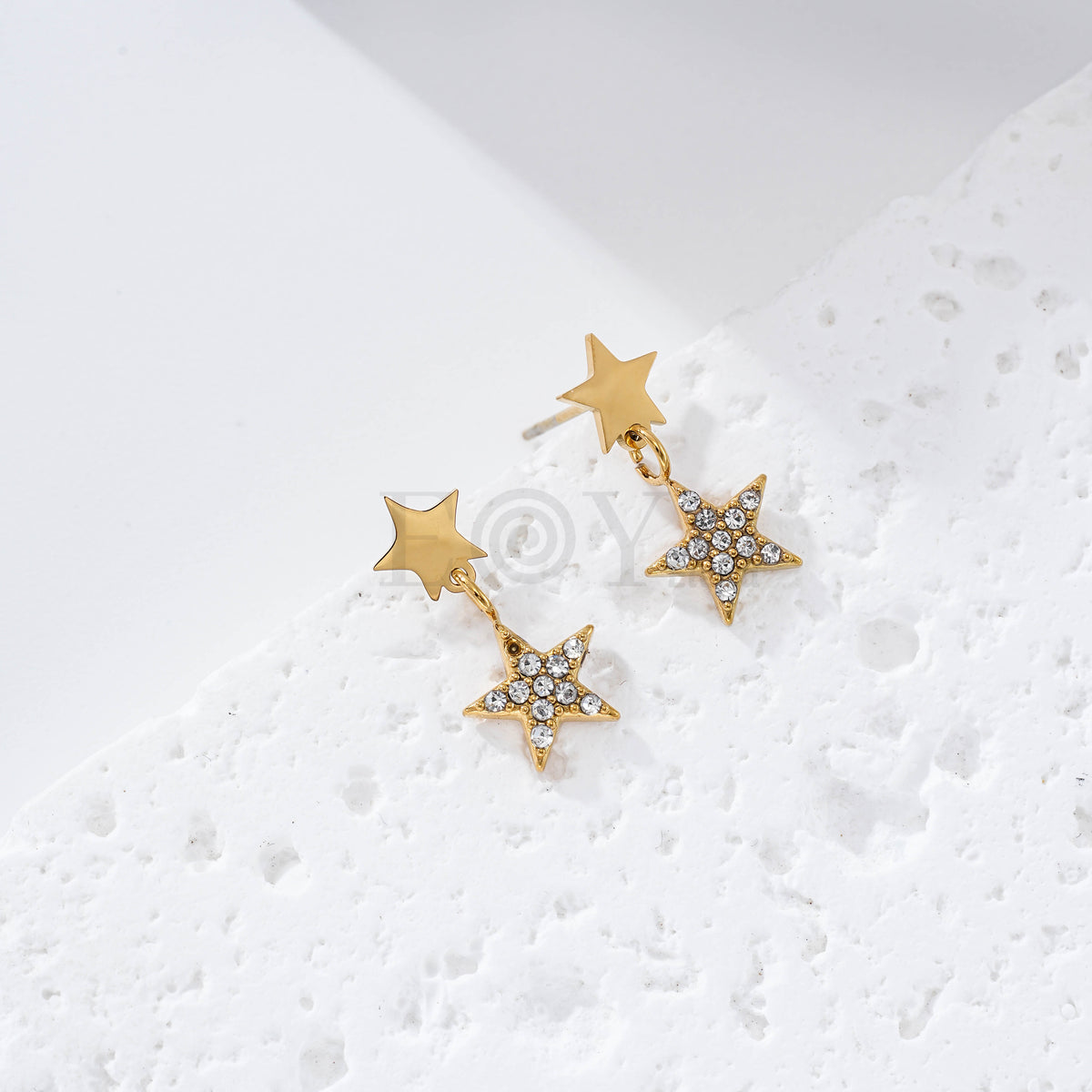 Pendientes doble estrella circonitas acero