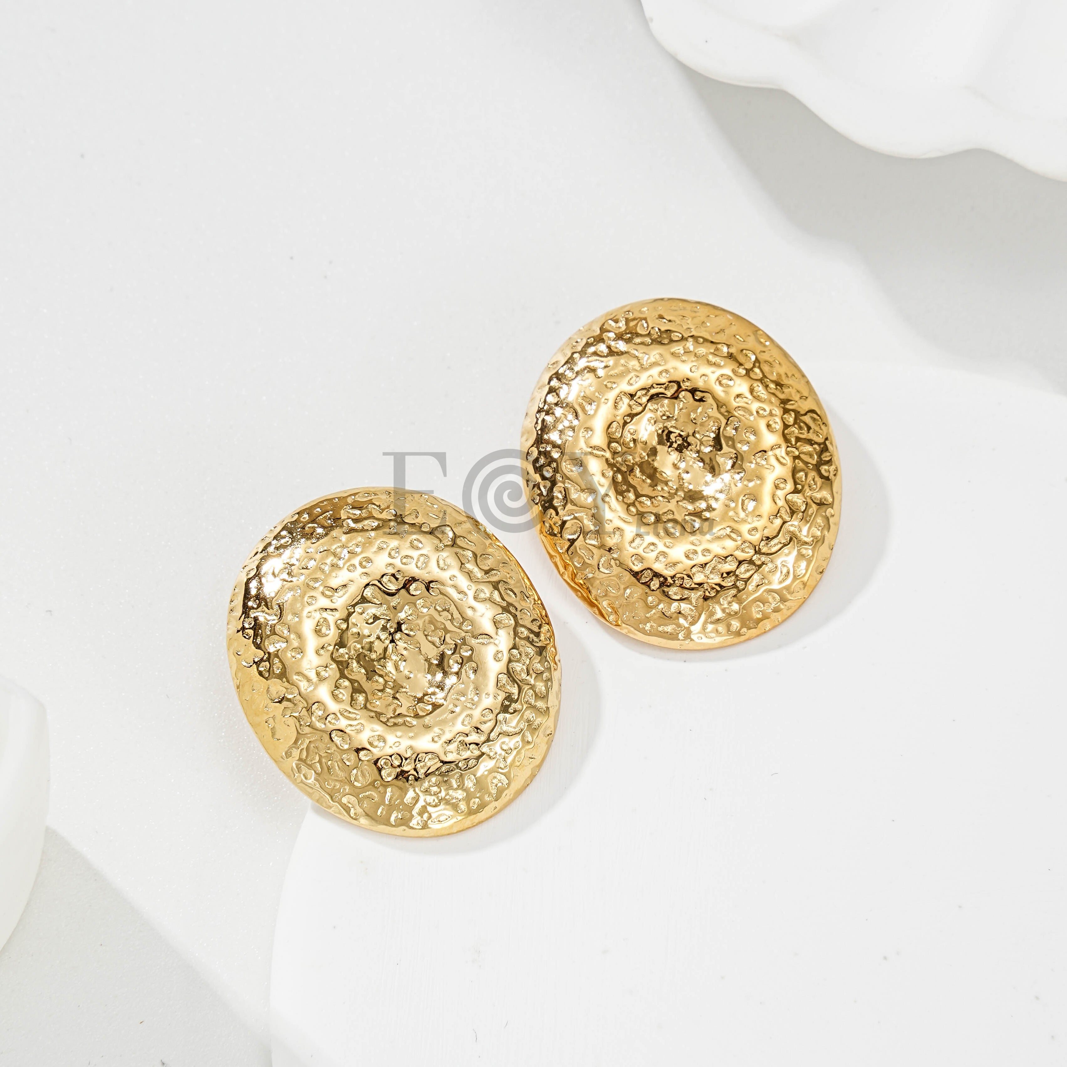 Pendientes circulares con textura irregular