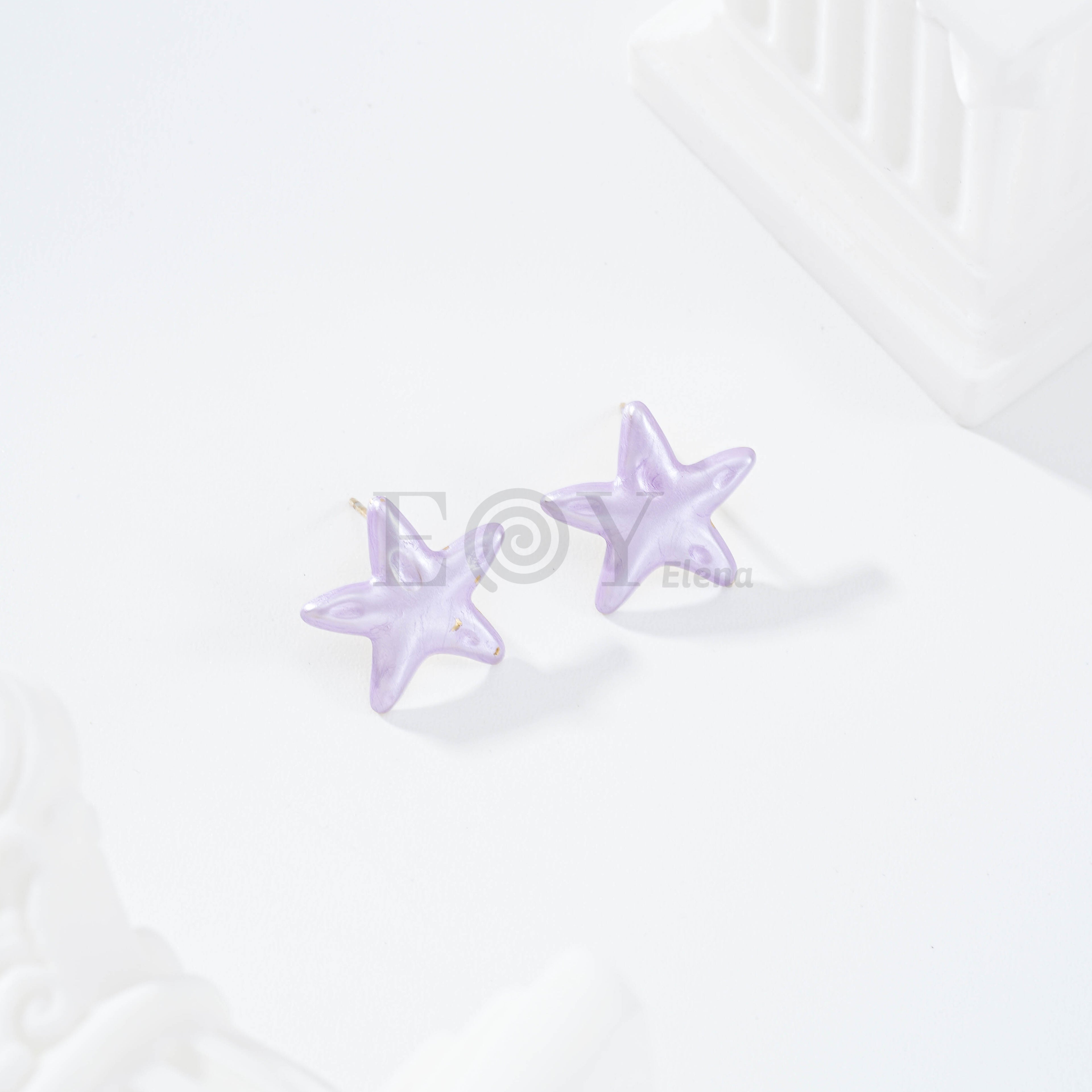 Pendientes estrella color