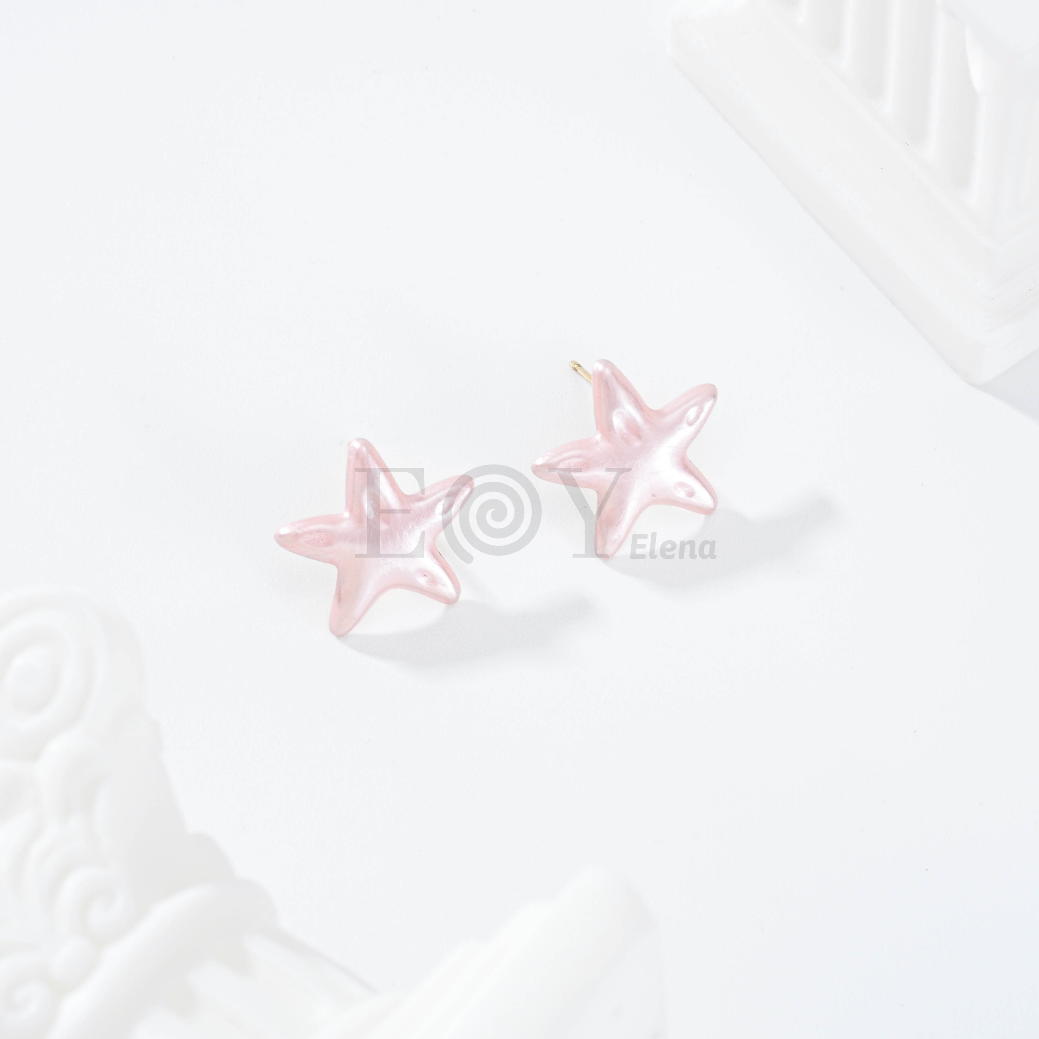 Pendientes estrella color