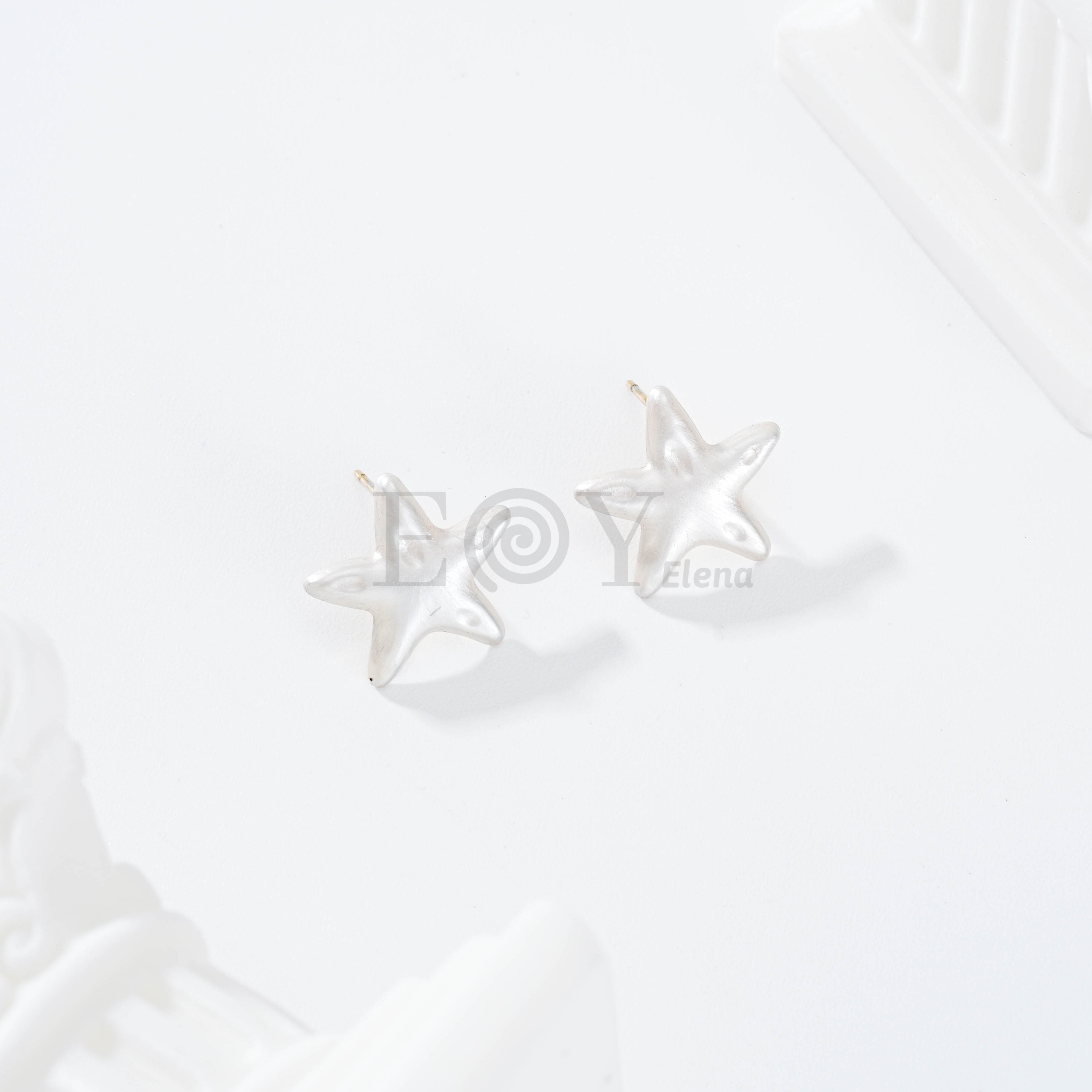 Pendientes estrella color