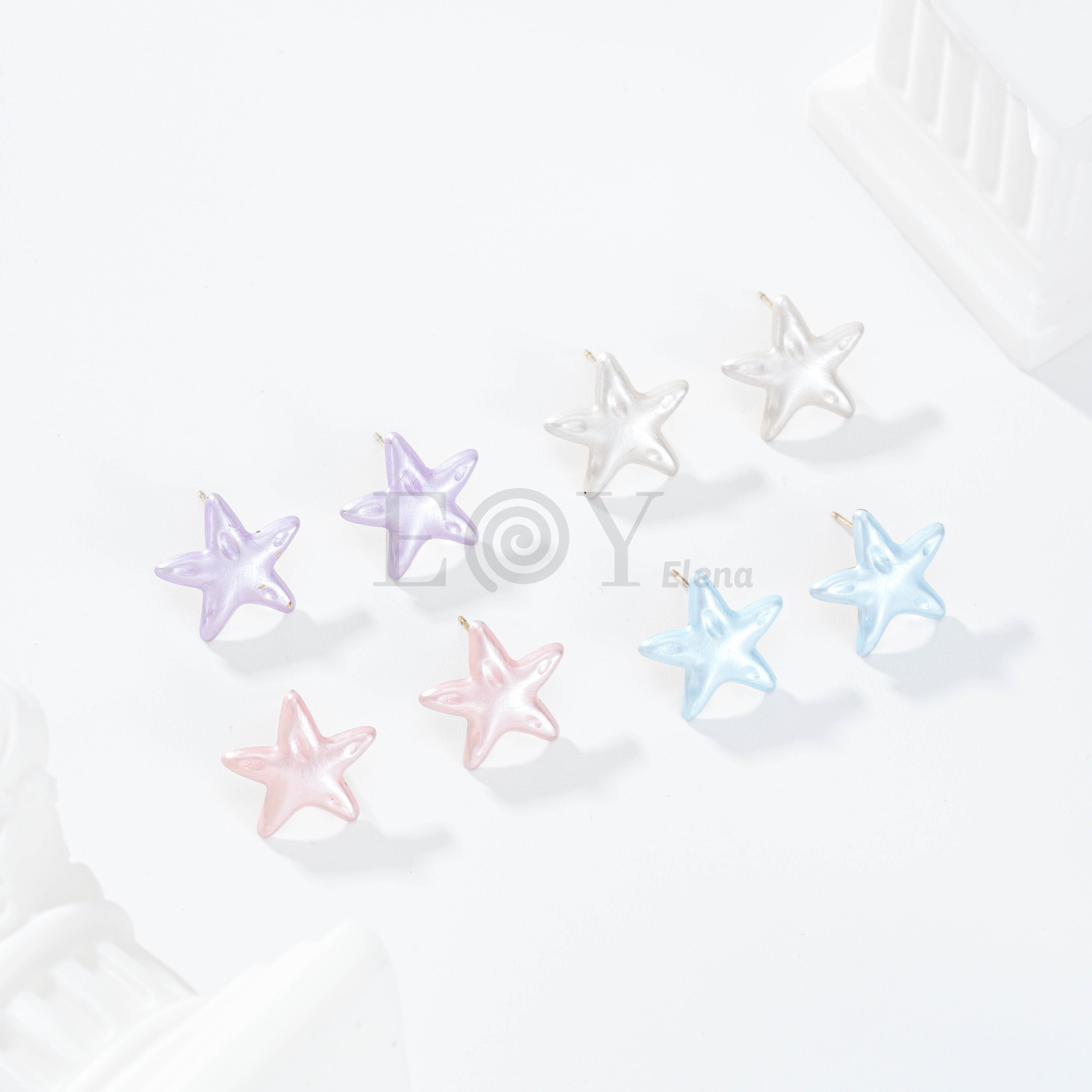 Pendientes estrella color