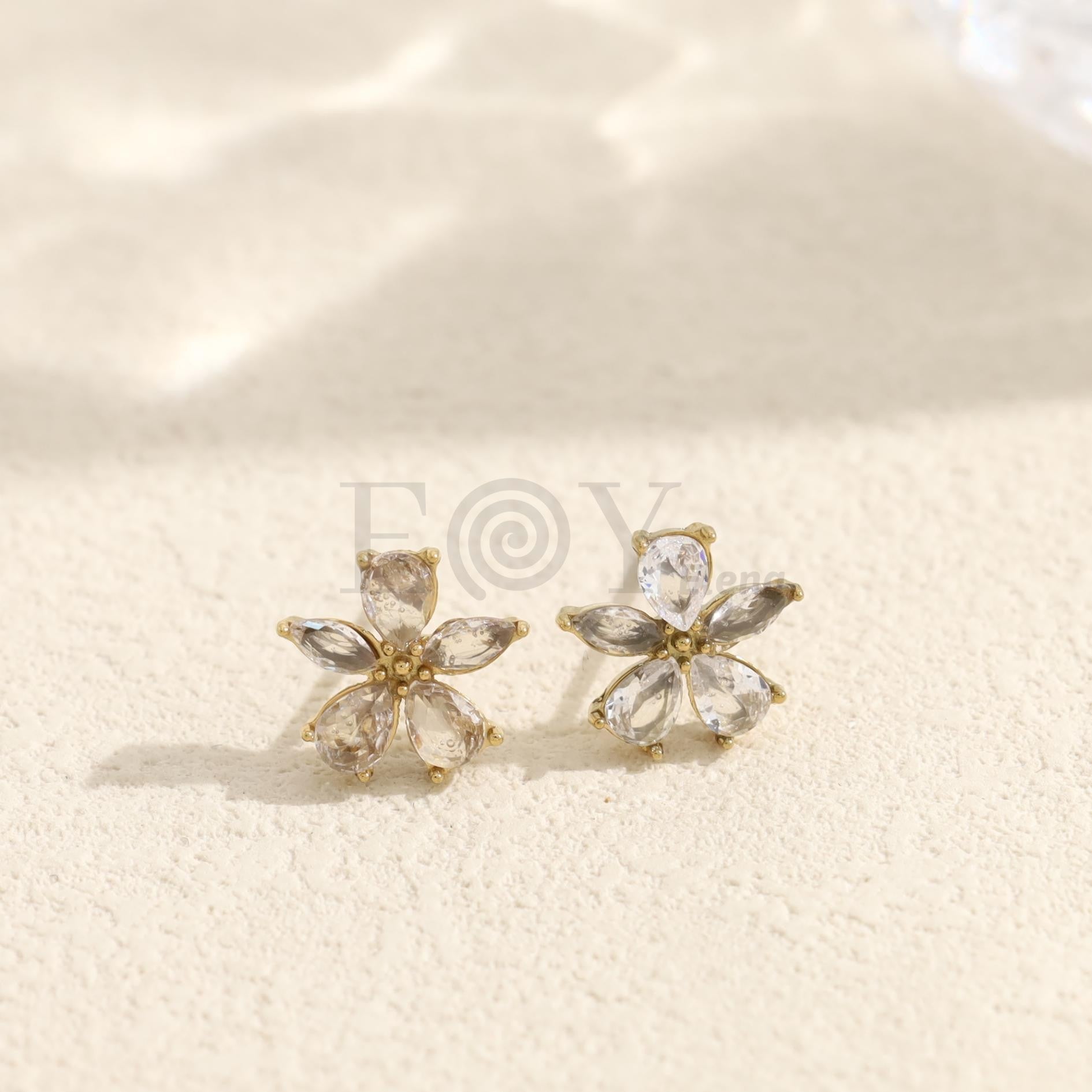Pendientes de flor con piedras transparentes