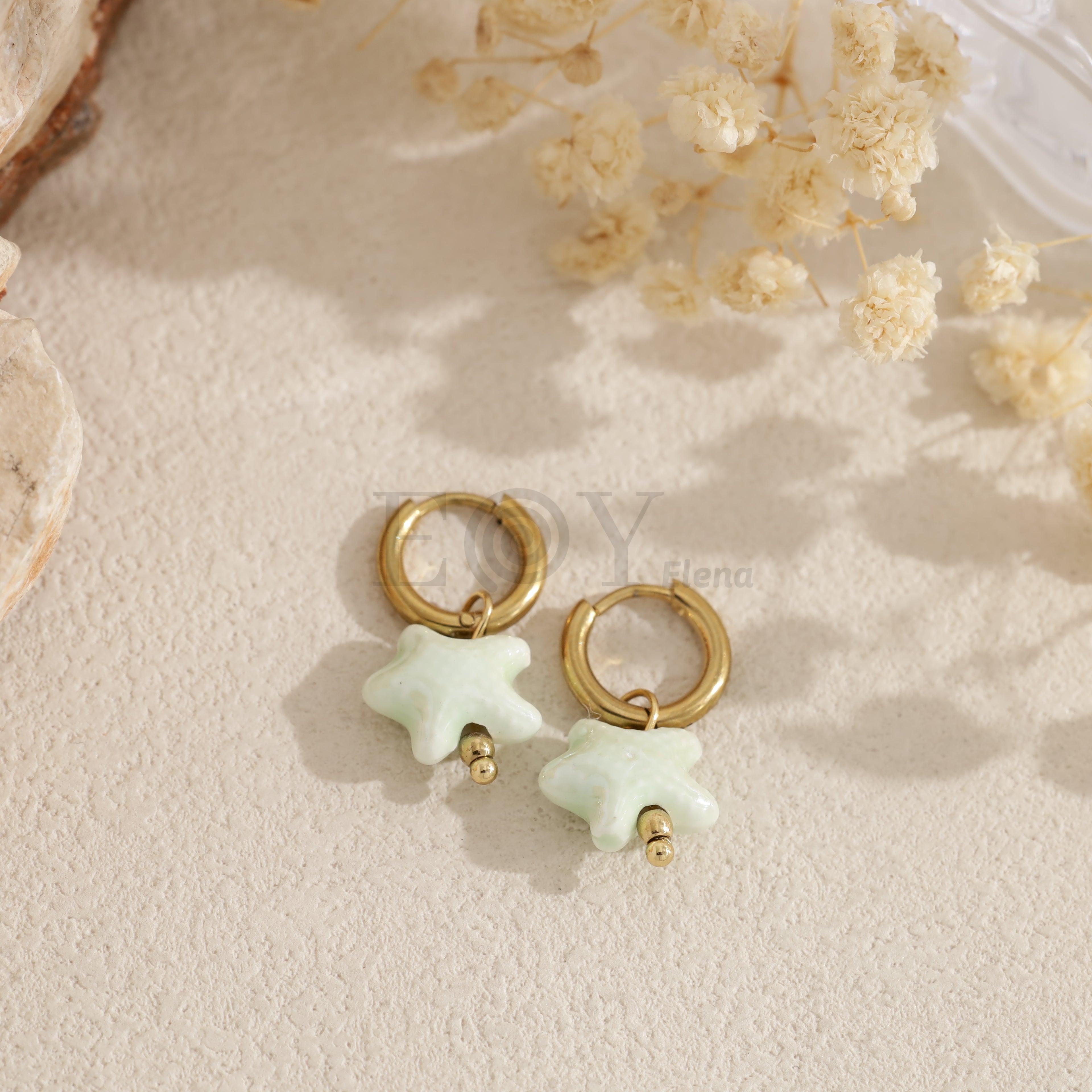 Pendientes de aro estrella color