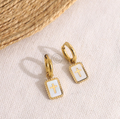 Pendientes de aro con chapa blanca con cruz