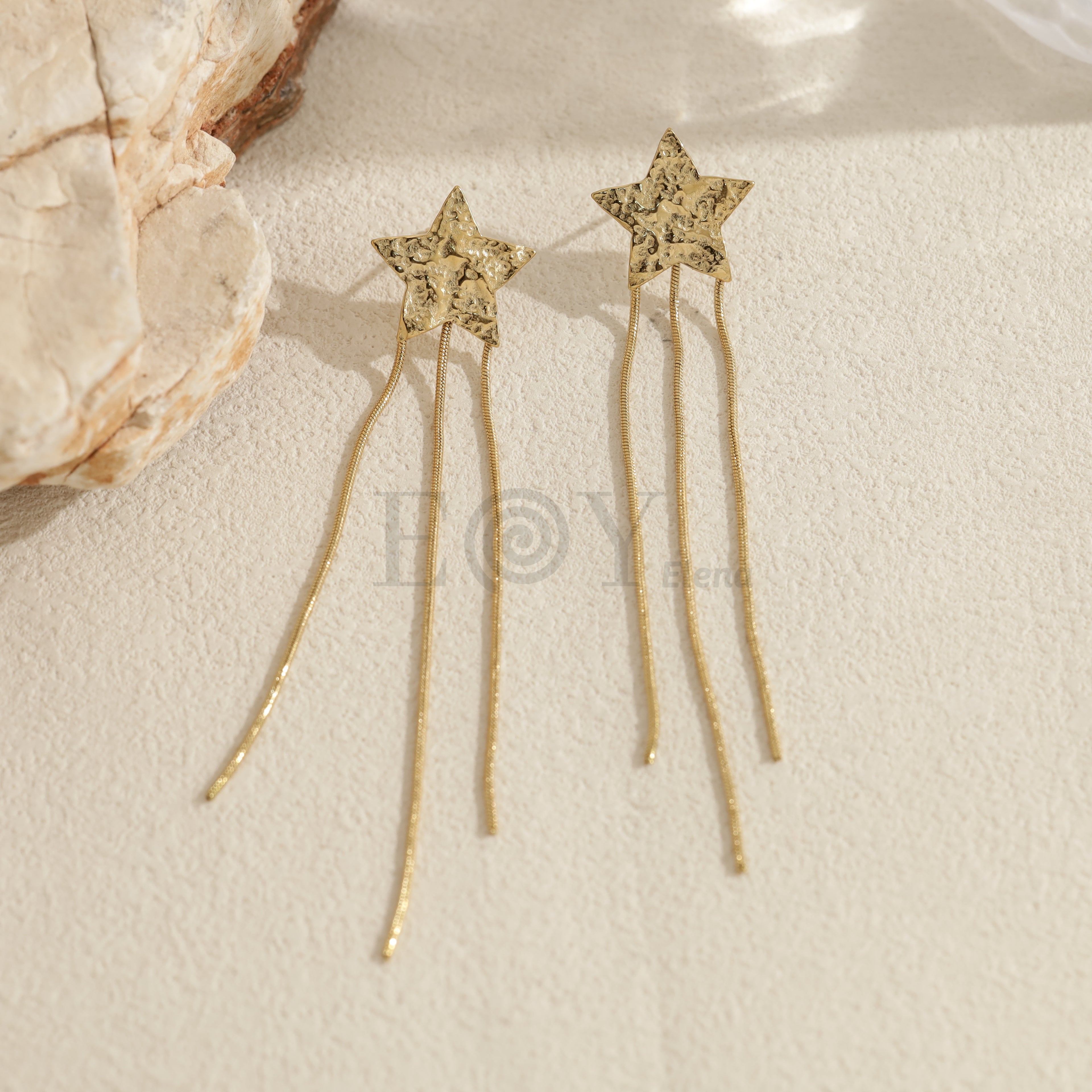 Pendientes largos estrella con cadenas