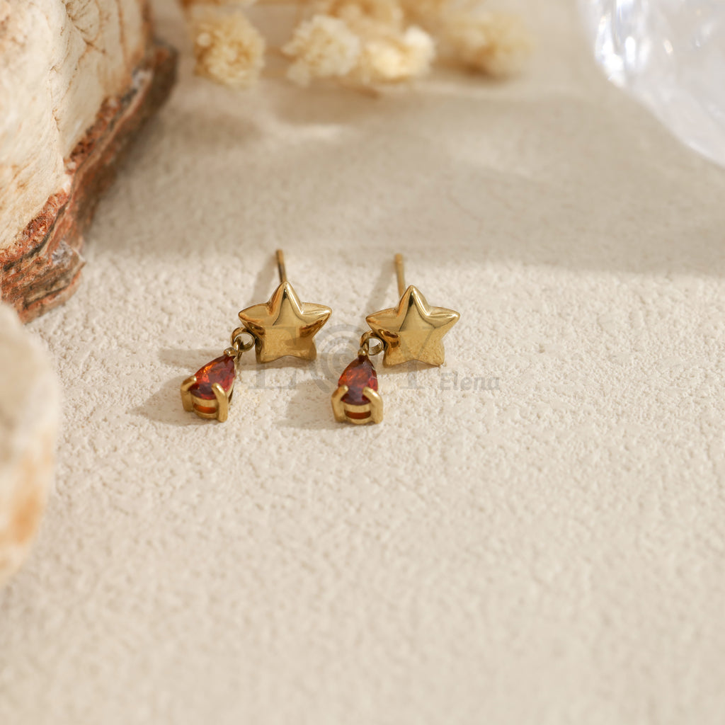 Pendientes con estrella y piedra en forma de lágrima