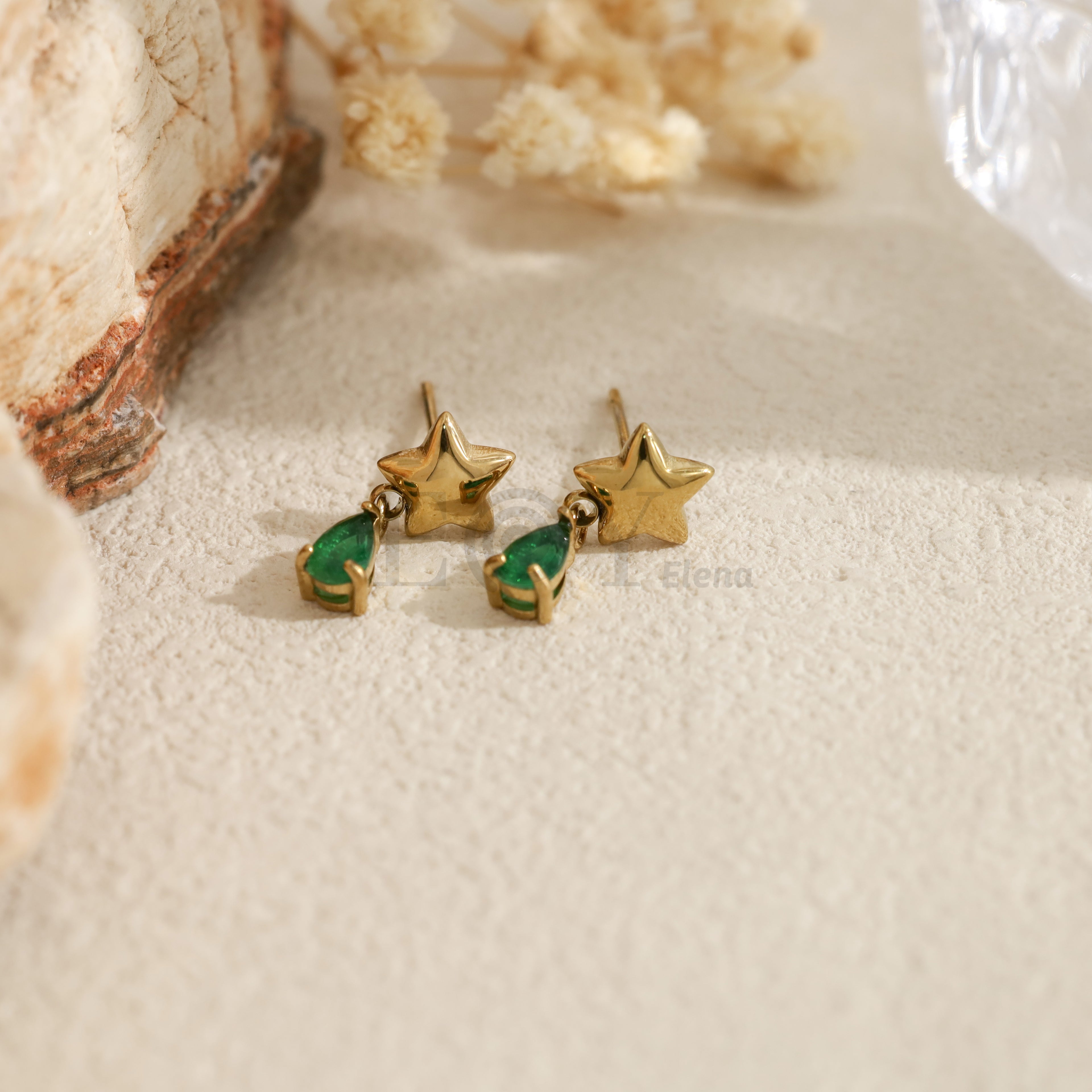 Pendientes con estrella y piedra en forma de lágrima