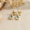 Pendientes con flor y piedra en forma de lágrima