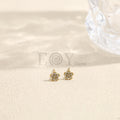 Pendientes pequeños de flor con piedras