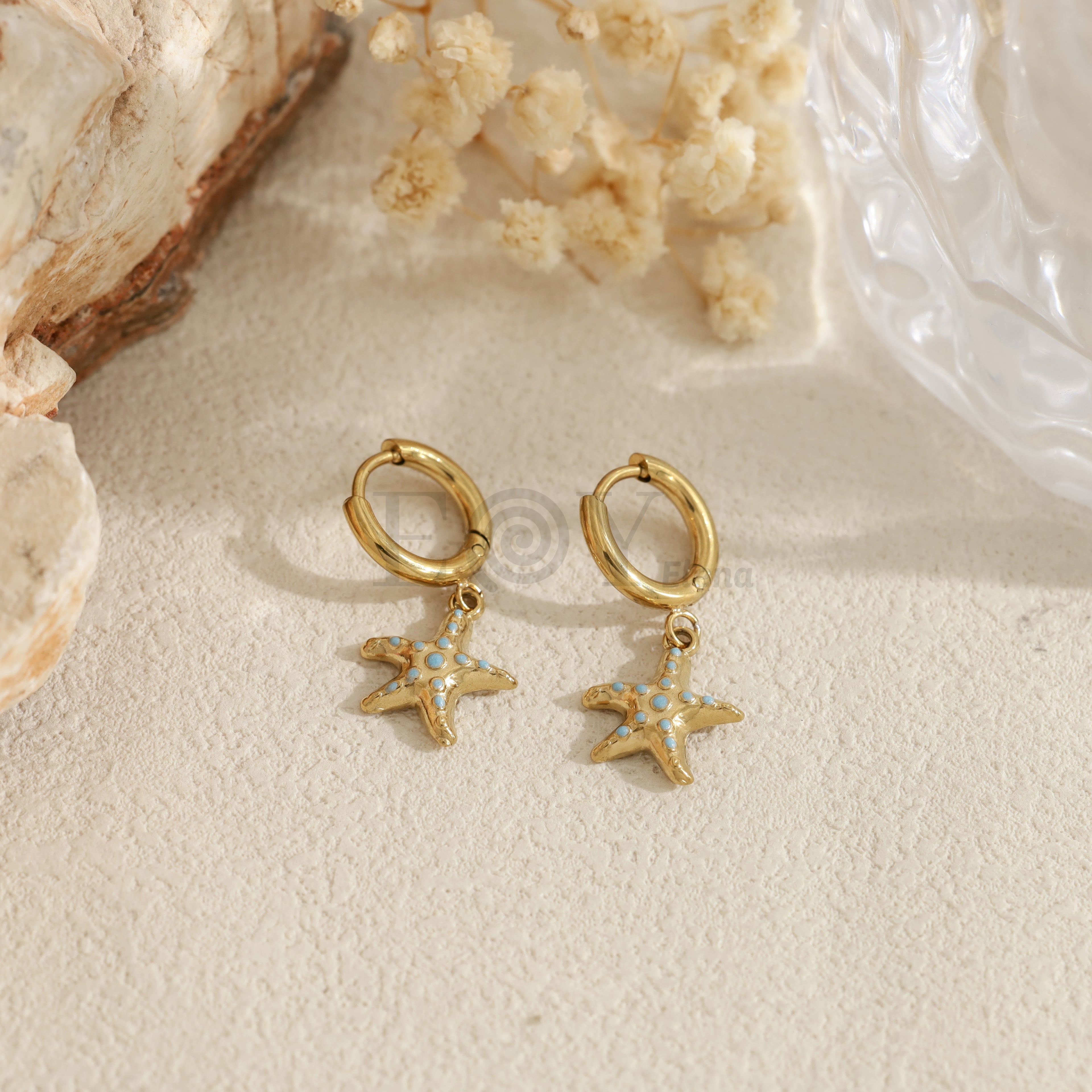 Pendientes de aro con colgante de estrella de mar