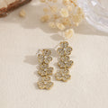 Pendientes largos de flores con circonitas