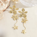 Pendientes largos flores doradas
