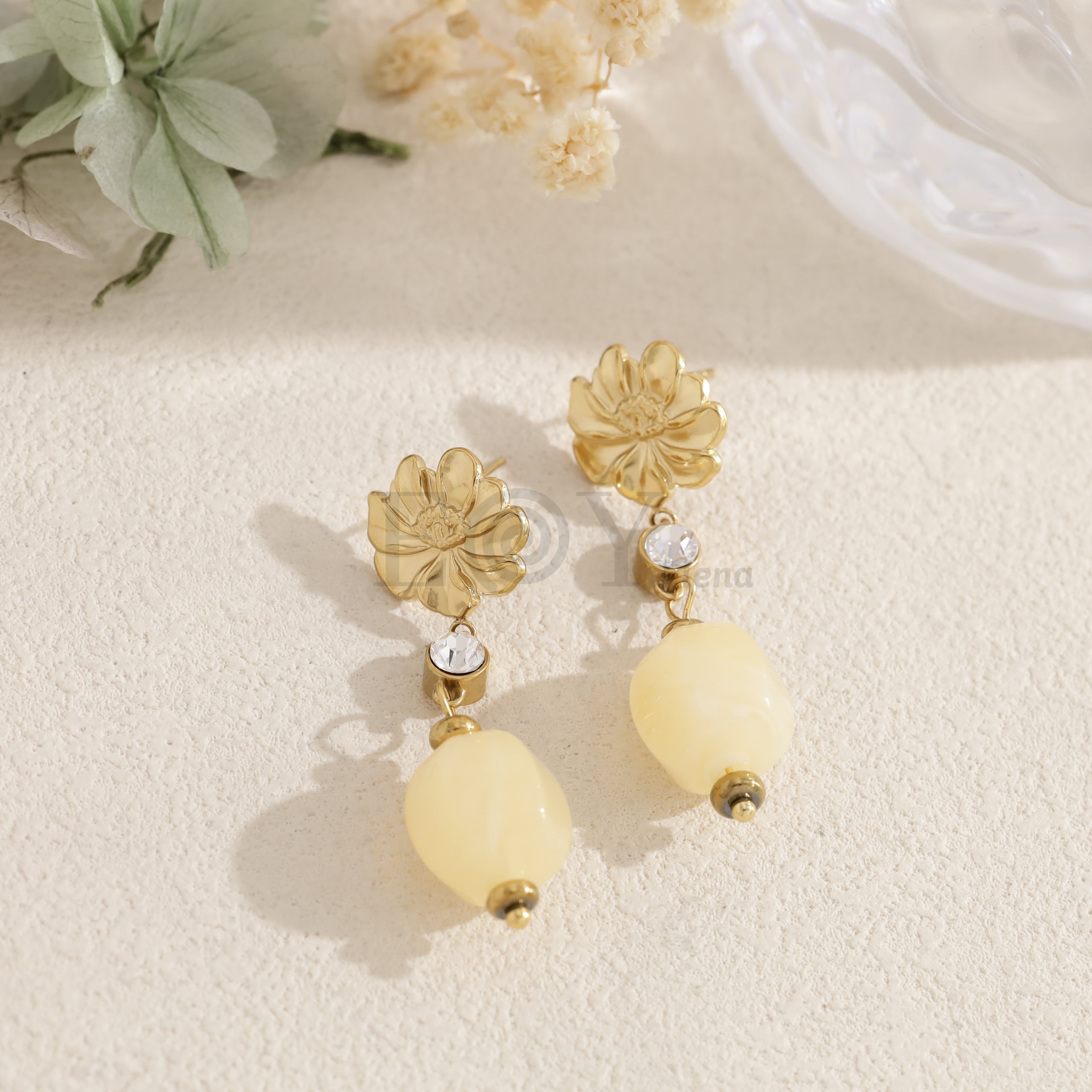 Pendientes flor con abalorio ovalado