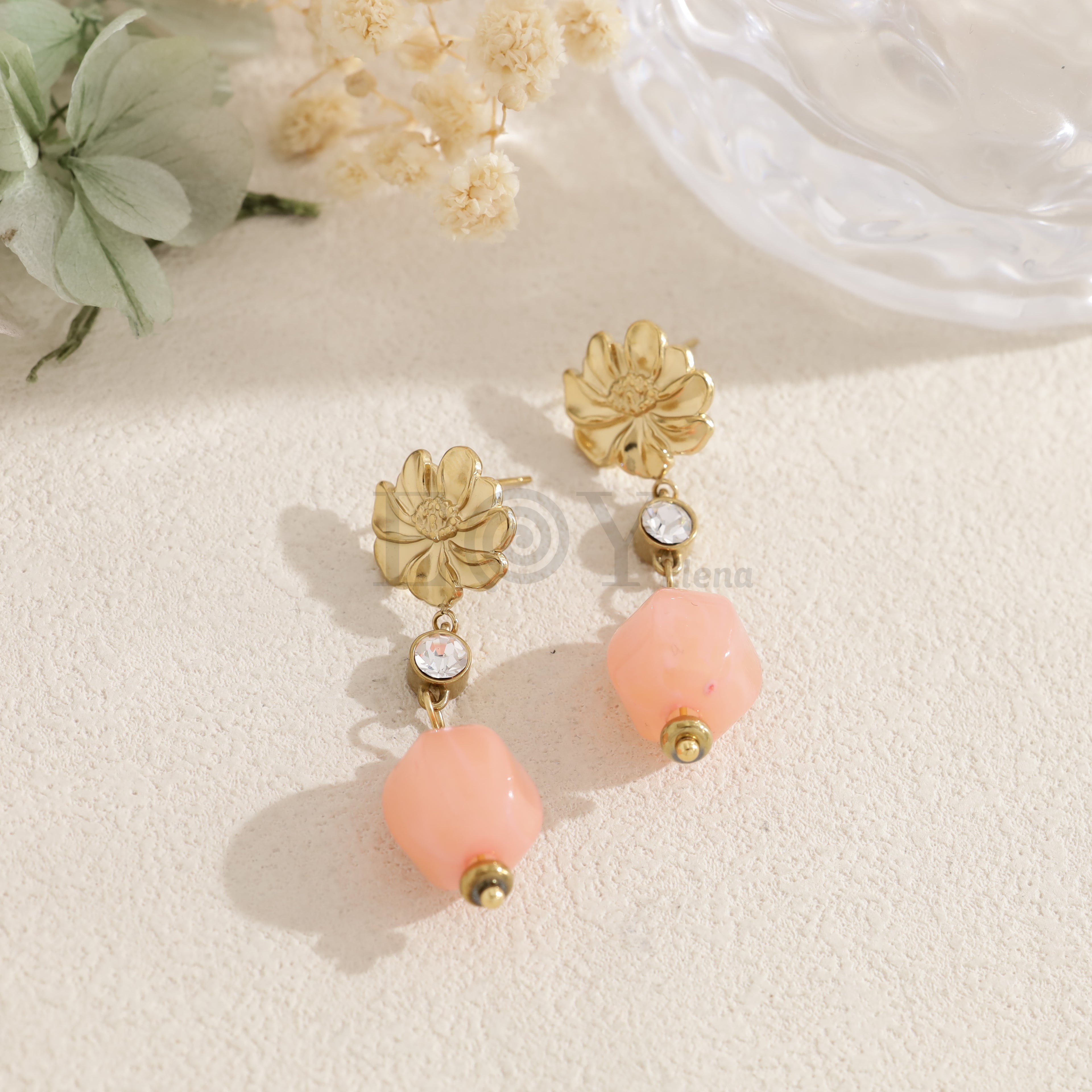 Pendientes flor con abalorio ovalado