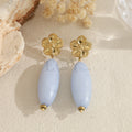 Pendientes largos con flor y pieza ovalada
