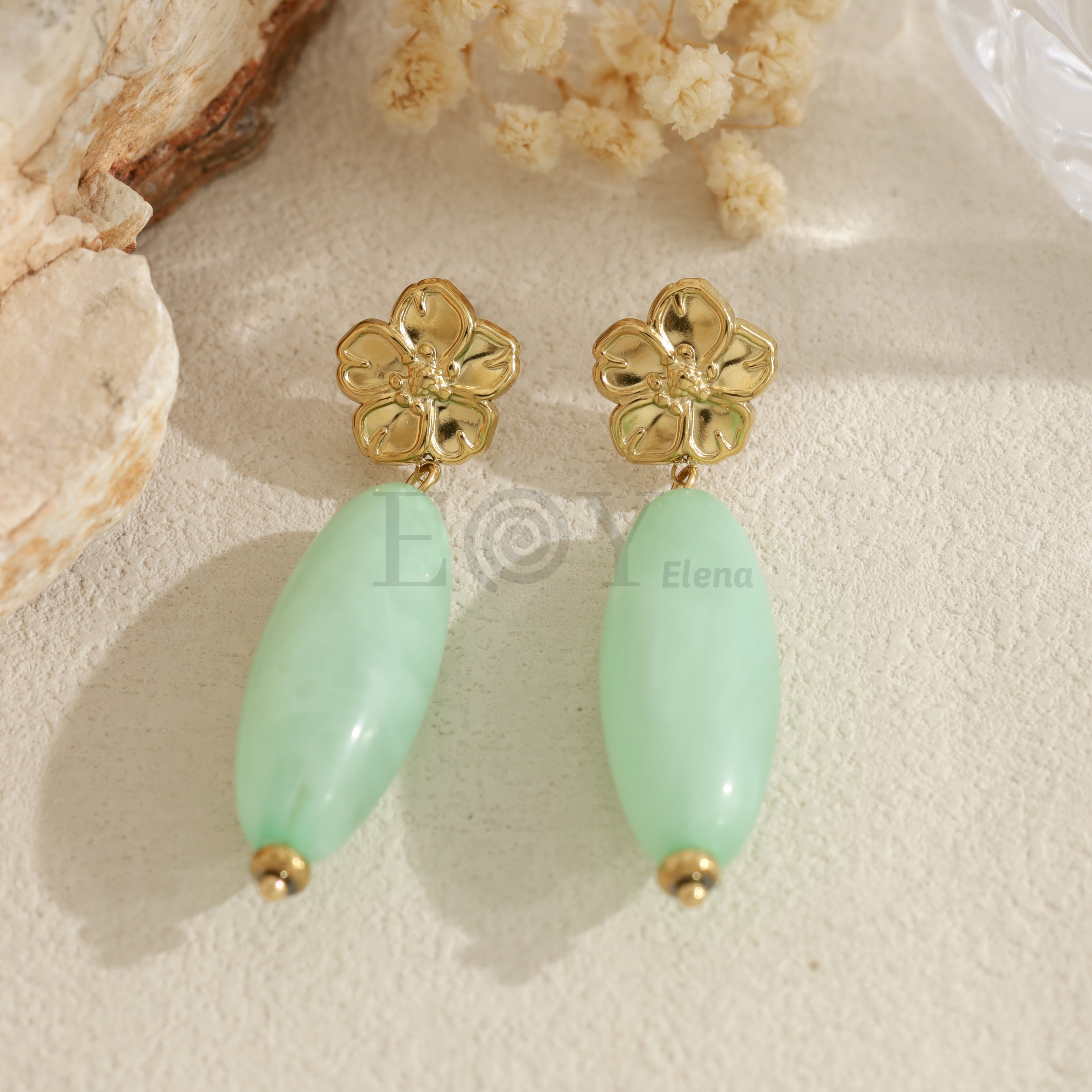 Pendientes largos con flor y pieza ovalada