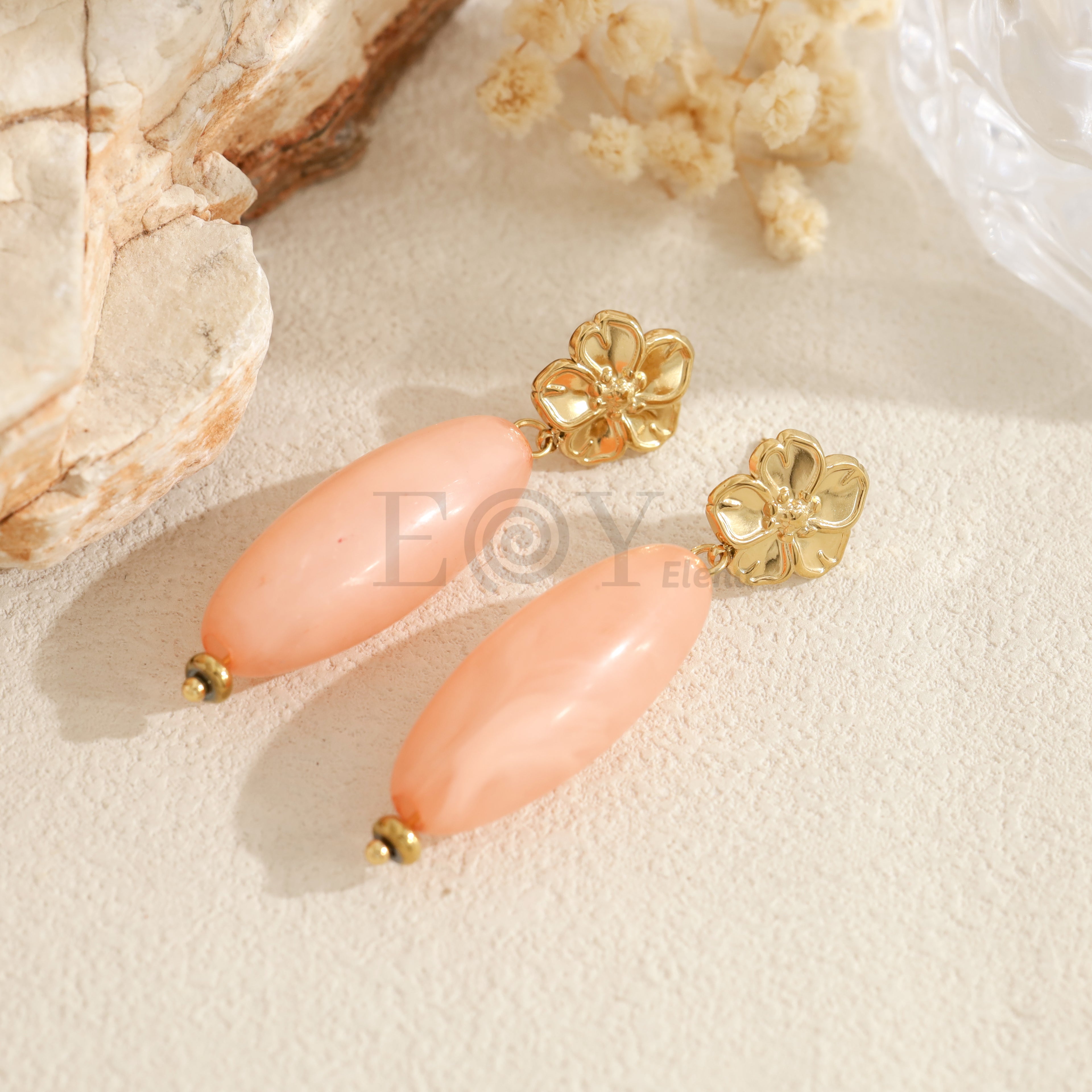 Pendientes largos con flor y pieza ovalada